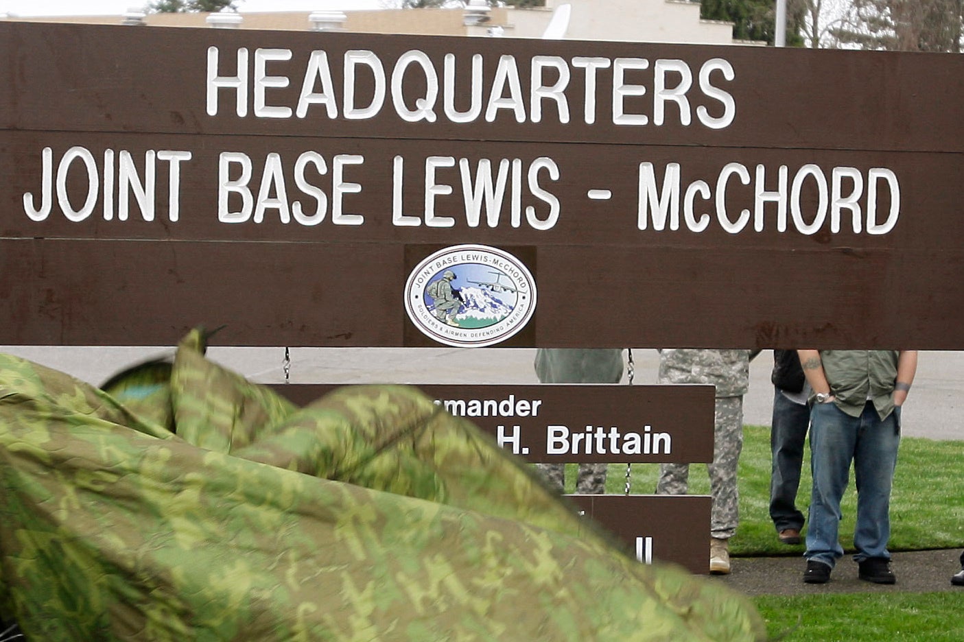 The two men are accused of attacking a soldier with a hammer at Joint Base Lewis-McChord