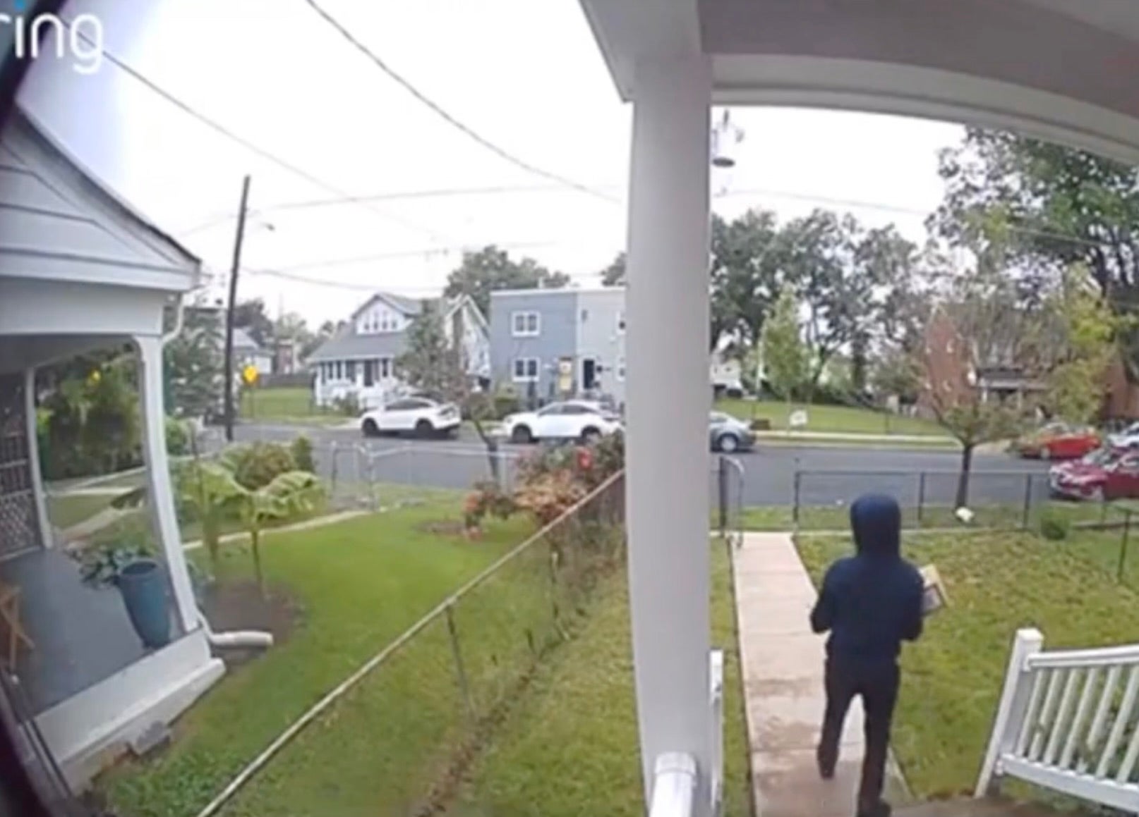 An unidentified person suspected of stealing the graduation regalia off the woman's porch