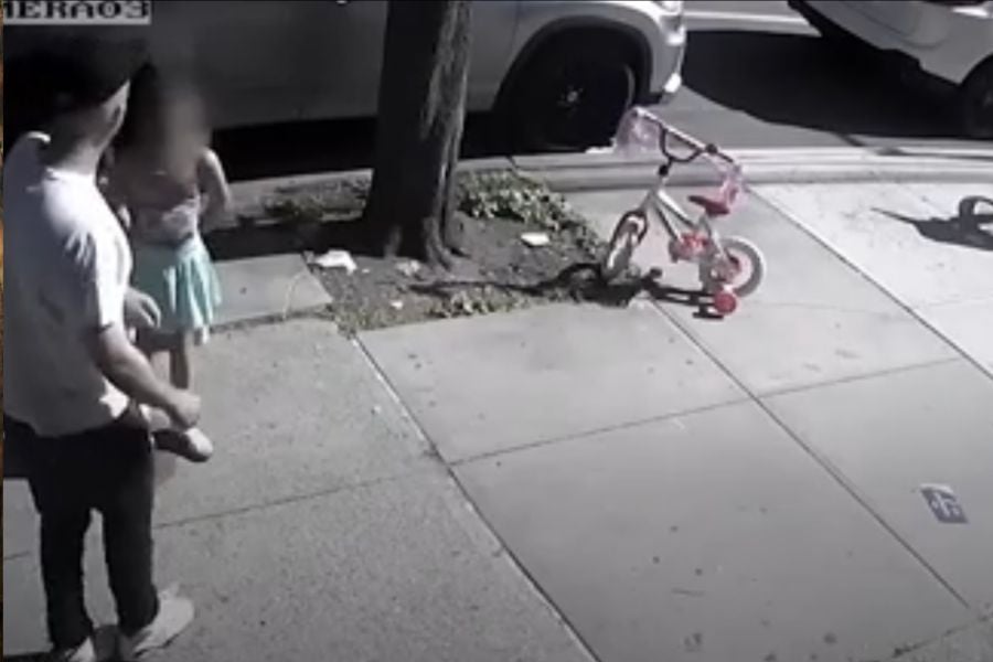 Feliz Enrique, 31, punched the girl in Queens the day before Mother's Day, authorities say. Video captured the shocking moment.
