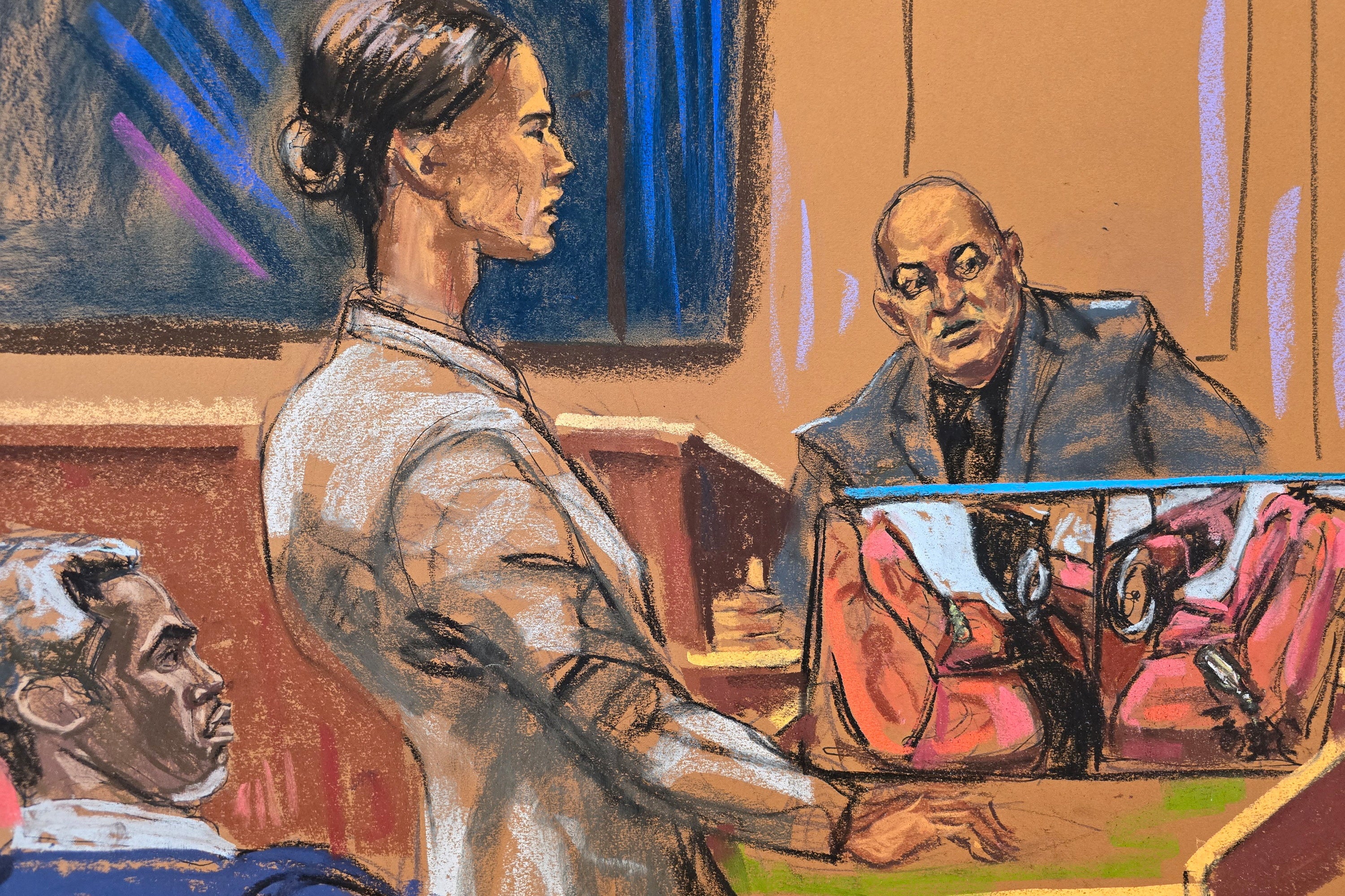 Combs watches as prosecutor Christy Slavik questions Los Angeles fire arson investigator Lance Jiminez