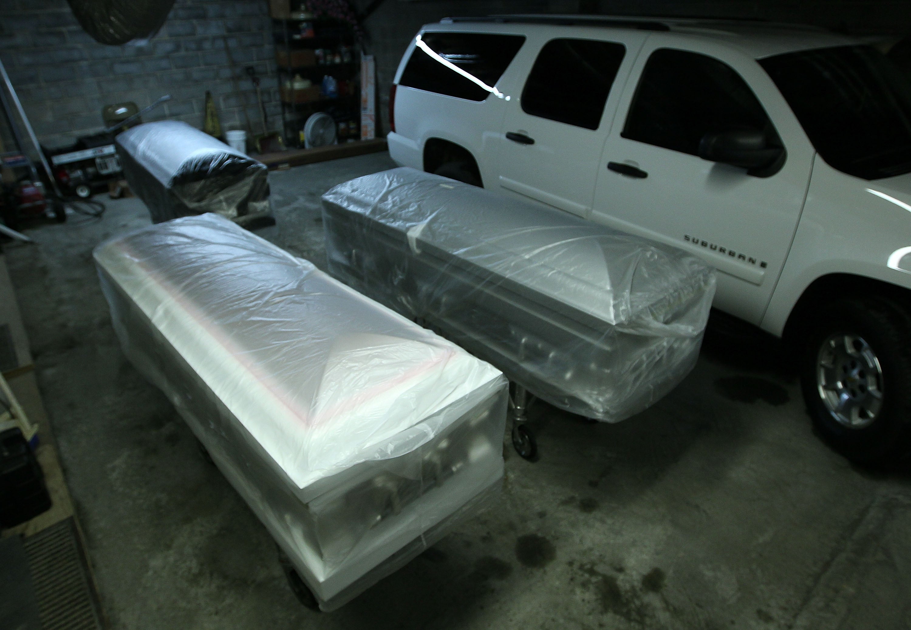 The man admitted to posting the photos with the caskets with the hope they would go viral.
