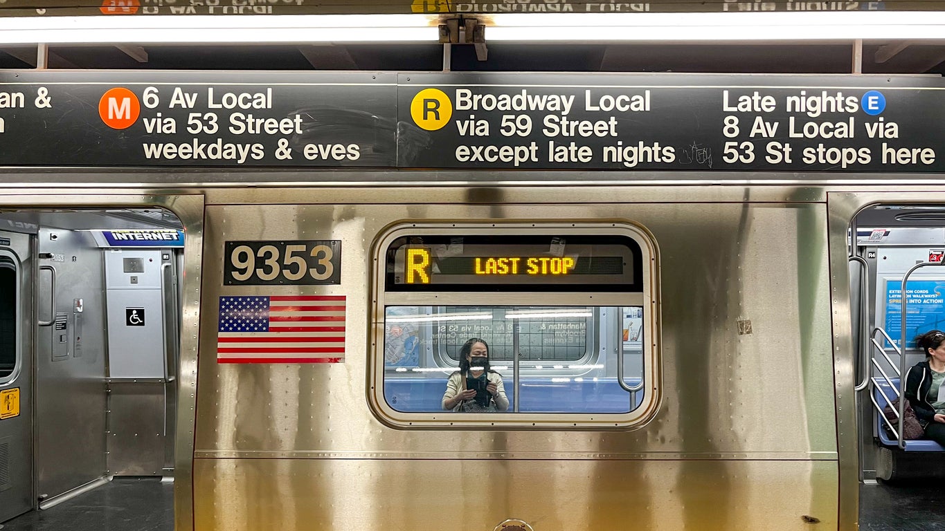A man has been arrested in New York after pushing one woman onto the subway tracks before punching another repeatedly in the face, police sources said. The incident occurred around 8.45 a.m. on the R subway line