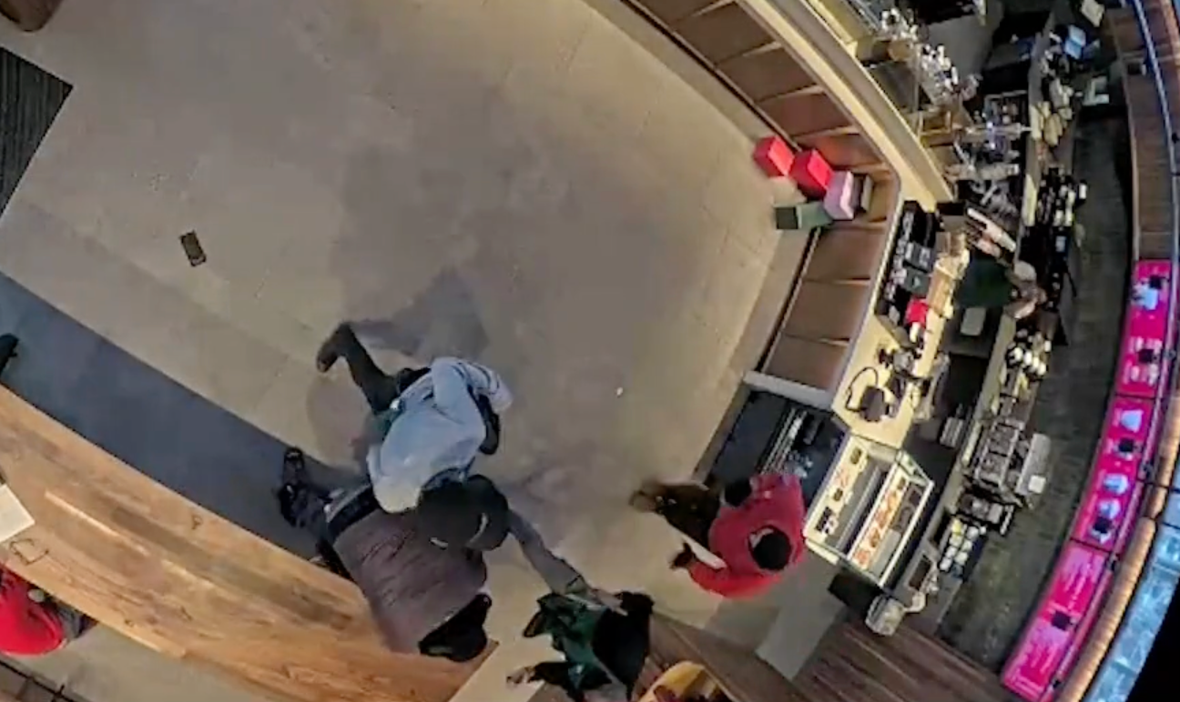 Michael Harris said his coworker realized the robbers' gun was fake