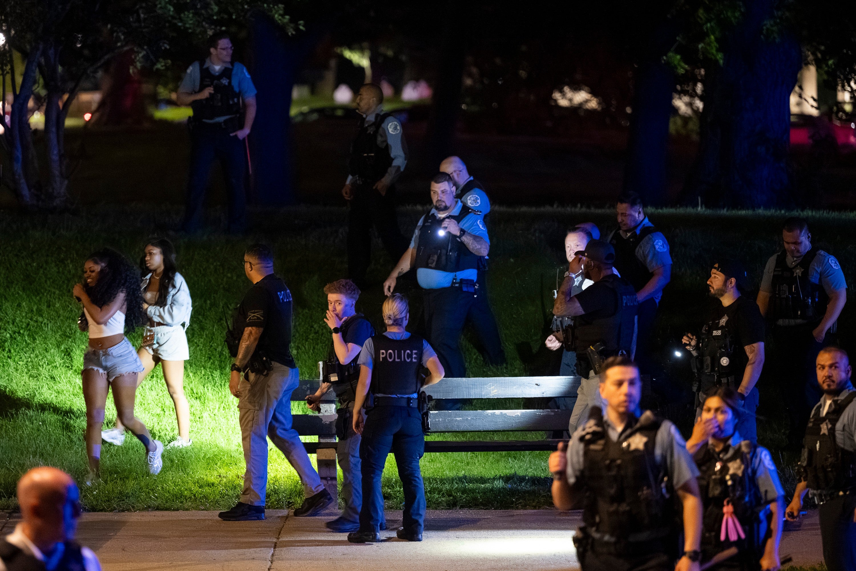 Chicago police officers attempt to disperse hundreds of young people near the Griffin Museum of Science and Industry in the Hyde Park neighborhood, Monday, May 25, 2026