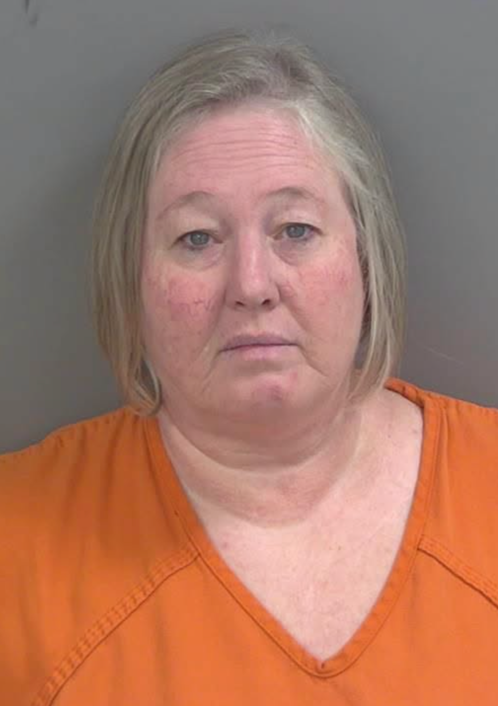 Jones has been charged with grand theft of between $20,000 and $100,000