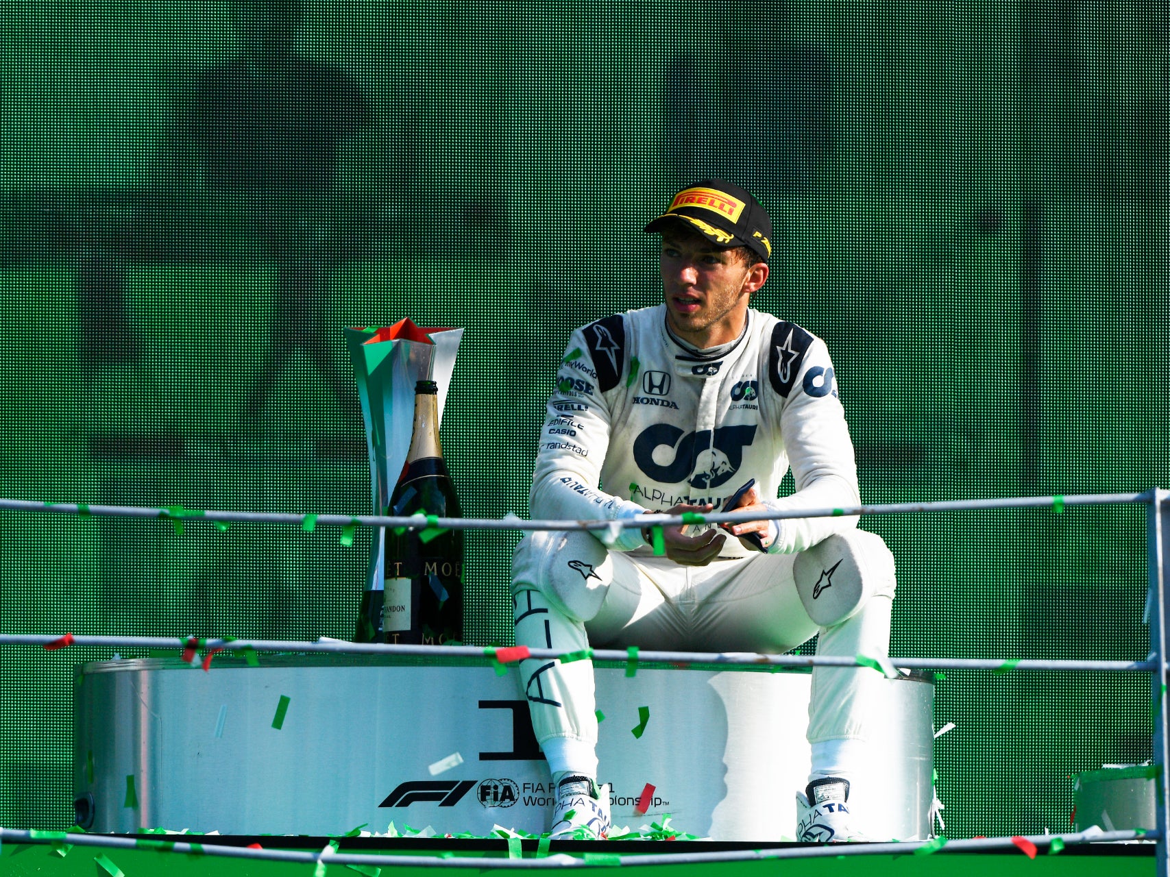 Pierre Gasly takes in the podium after winning the Italian Grand Prix