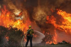 California burning: LA hits record 121F as state battles two dozen blazes and firenadoes