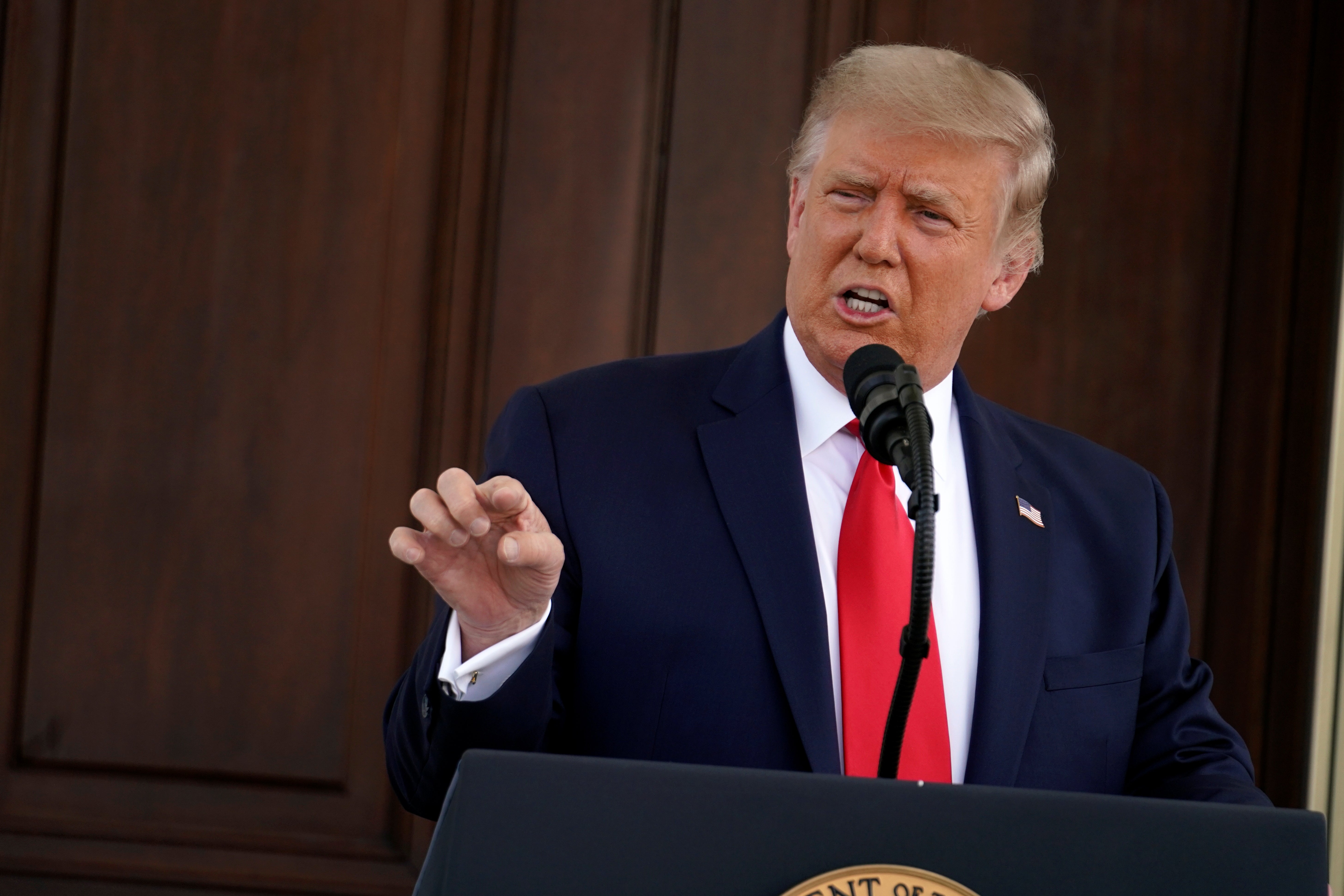 Trump says caution over coronavirus vaccine is 'fake political rhetoric'