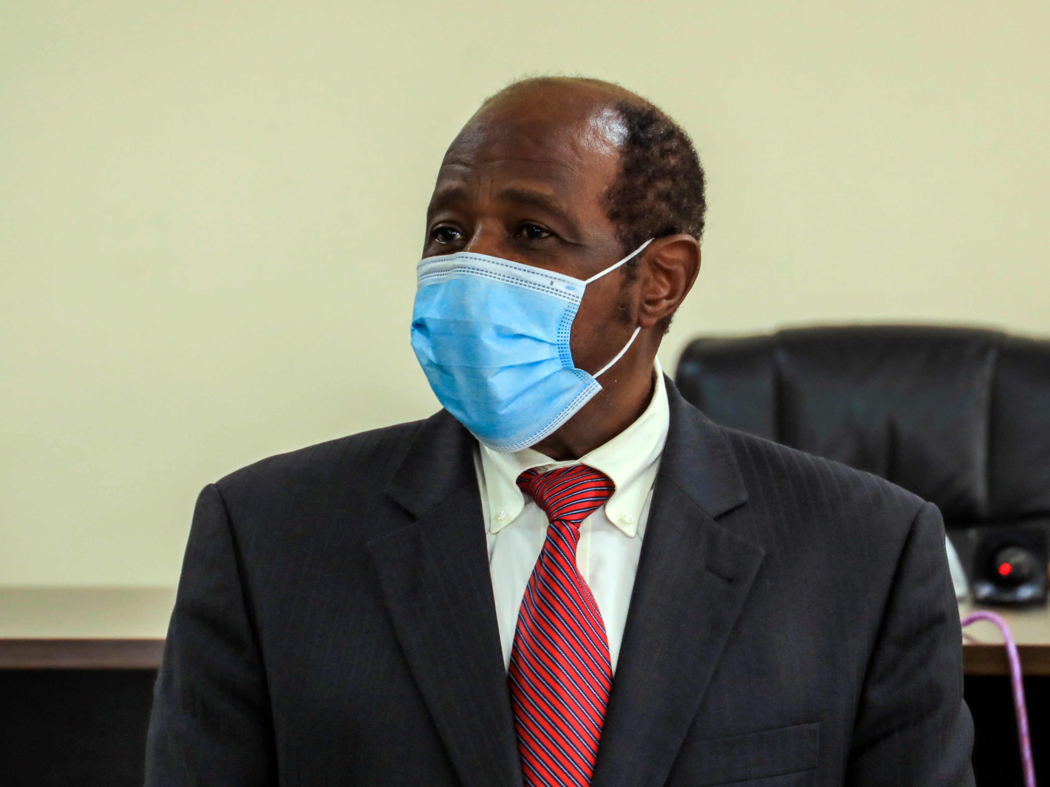 Rusesabagina appears in front of media at the headquarters of the Rwanda Bureau of investigations building in Kigali, Rwanda