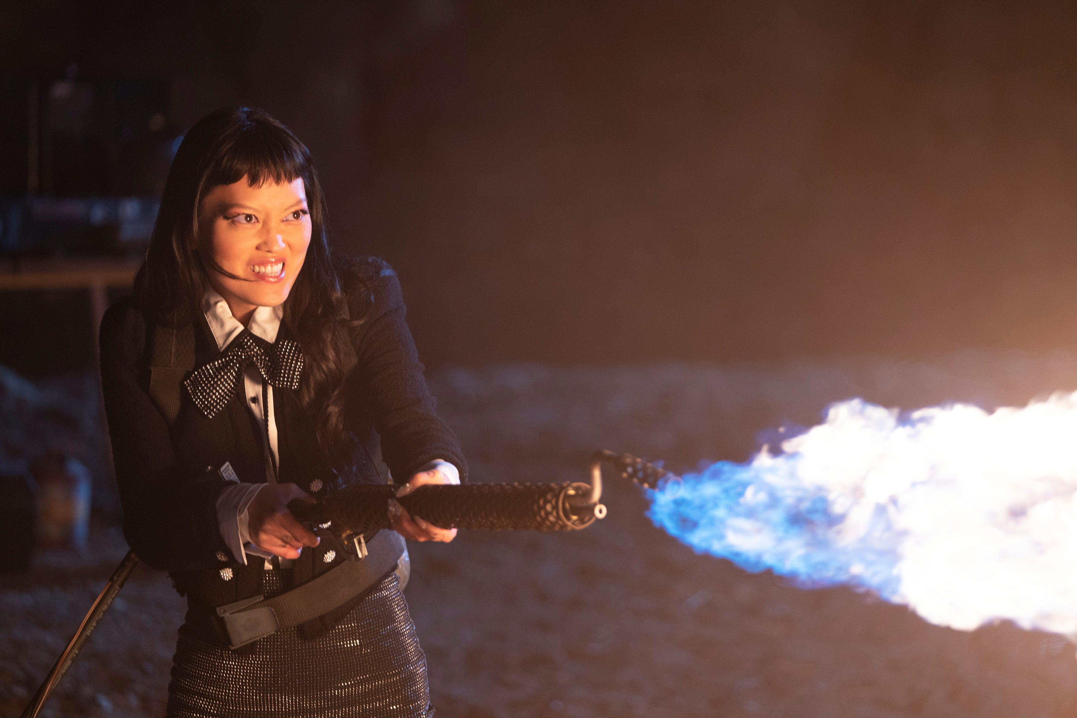 Lee and her flamethrower in 'The Babysitter: Killer Queen'