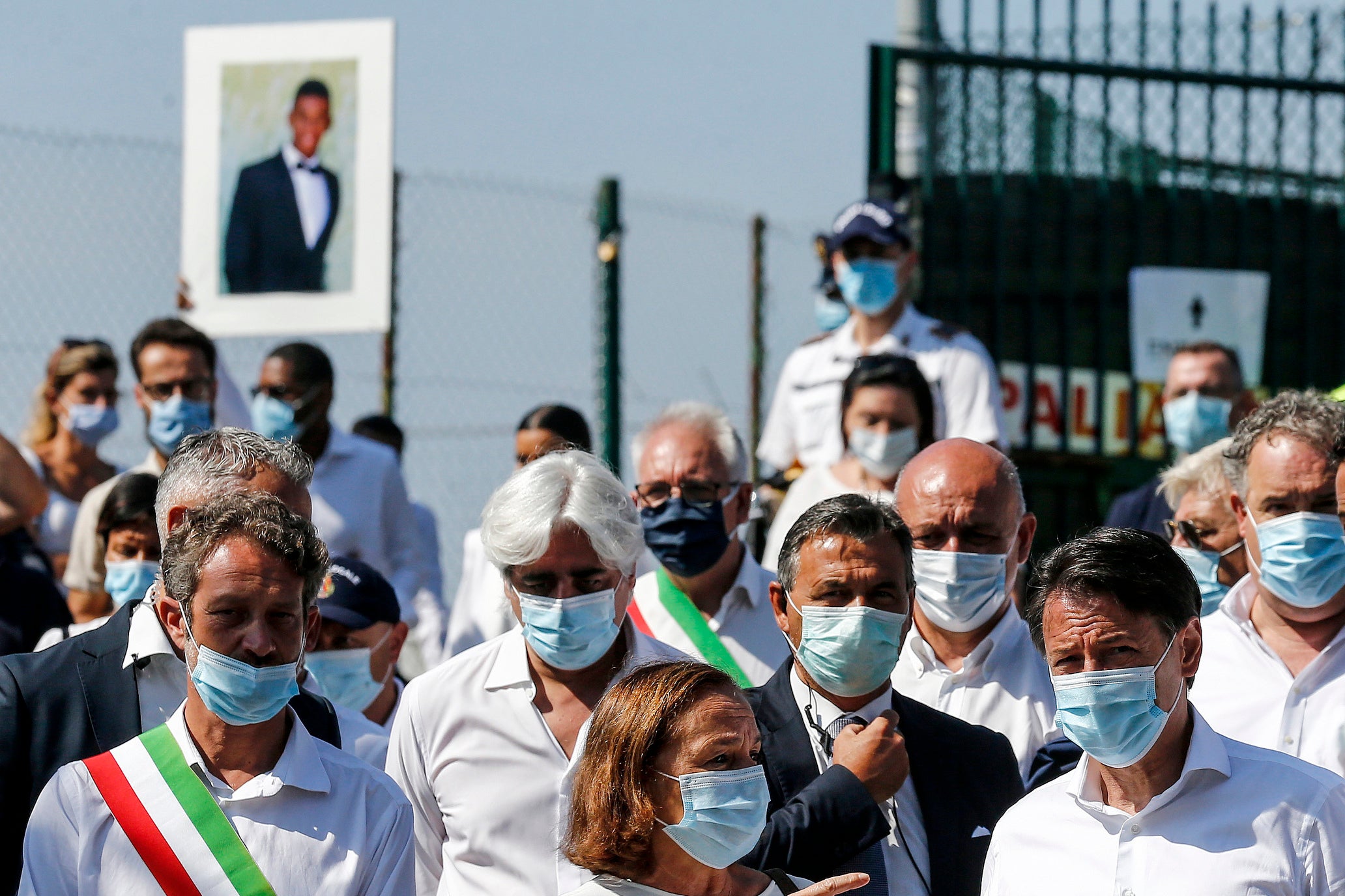 Prime minister Giuseppe Conte, right, leaves the funeral of Willy Monteiro Duarte in Paliano