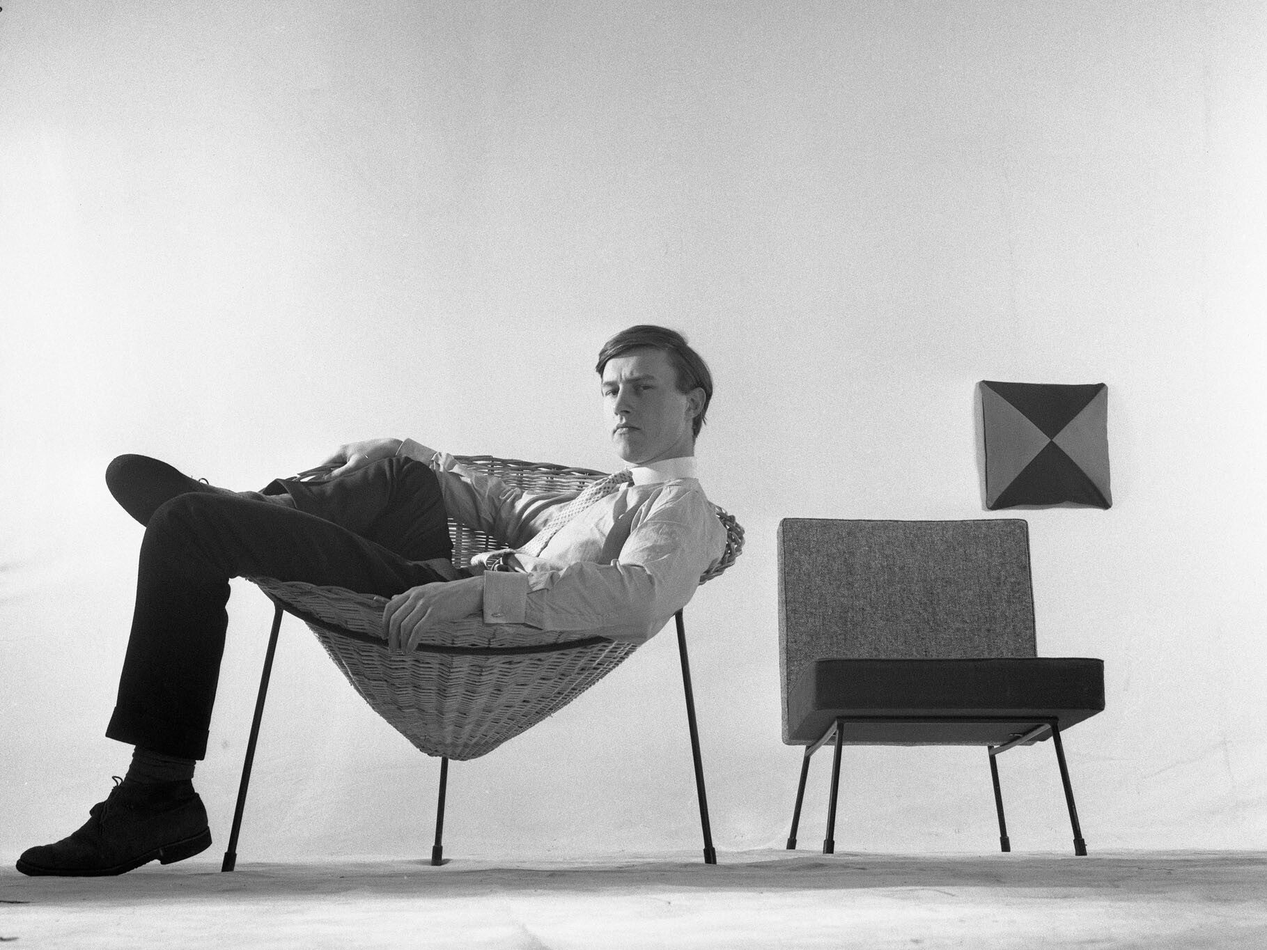 Conran and one of his earliest designs, the Cone Chair, in the 1950s