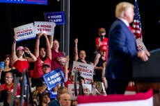 ‘I'm on stage so I'm very far away’: Trump says he's not afraid of contracting coronavirus at his rallies, doesn't mention crowds of supporters