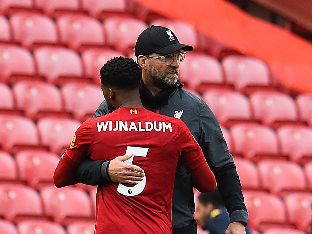 Liverpool manager Jurgen Klopp with midfielder Georginio Wijnaldum