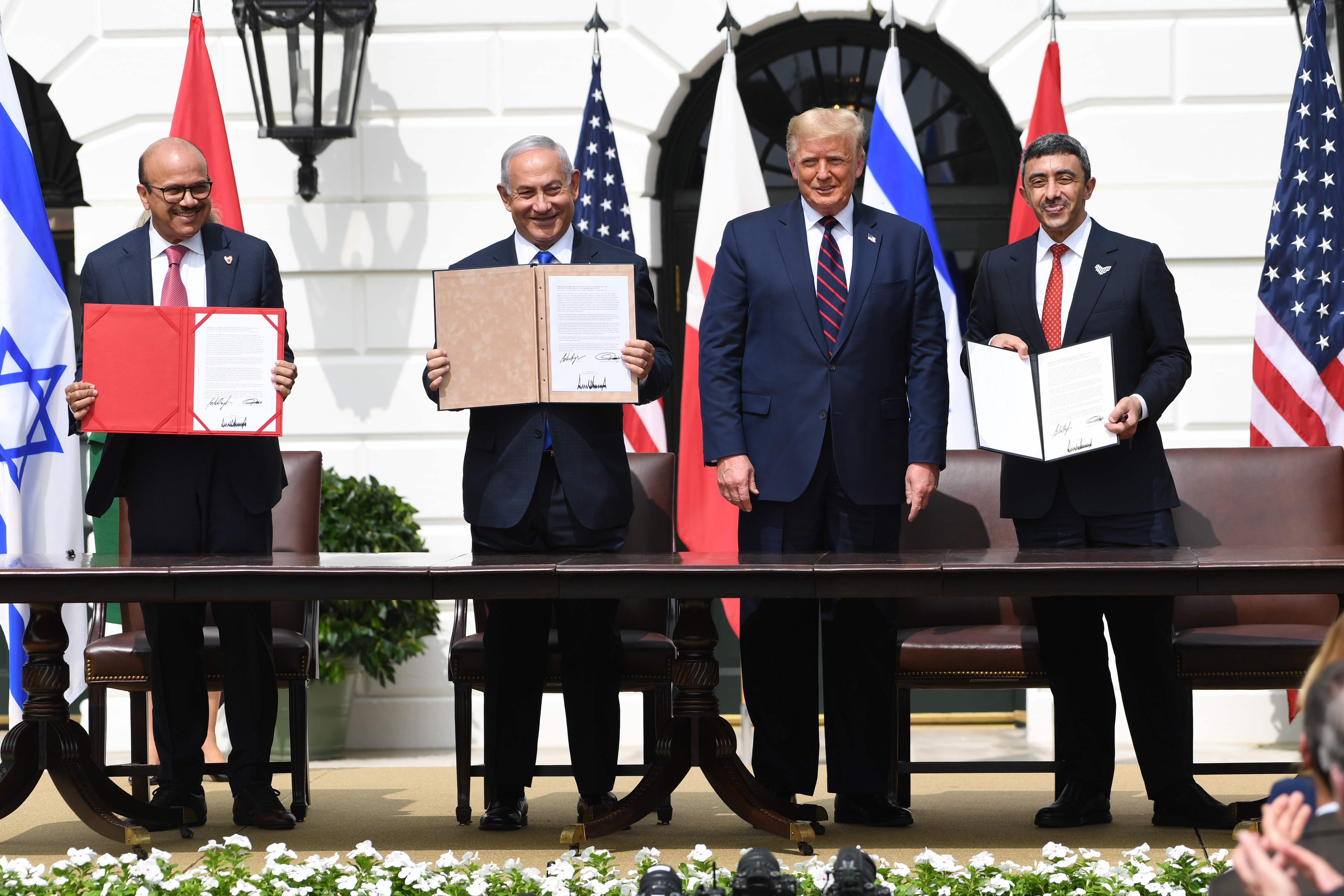 (From left to right) Abdullatif Al Zayani, Benjamin Netanyahu, Donald Trump and Abdullah bin Zayed al-Nahyan participate in the signing of the ‘Abraham Accords’