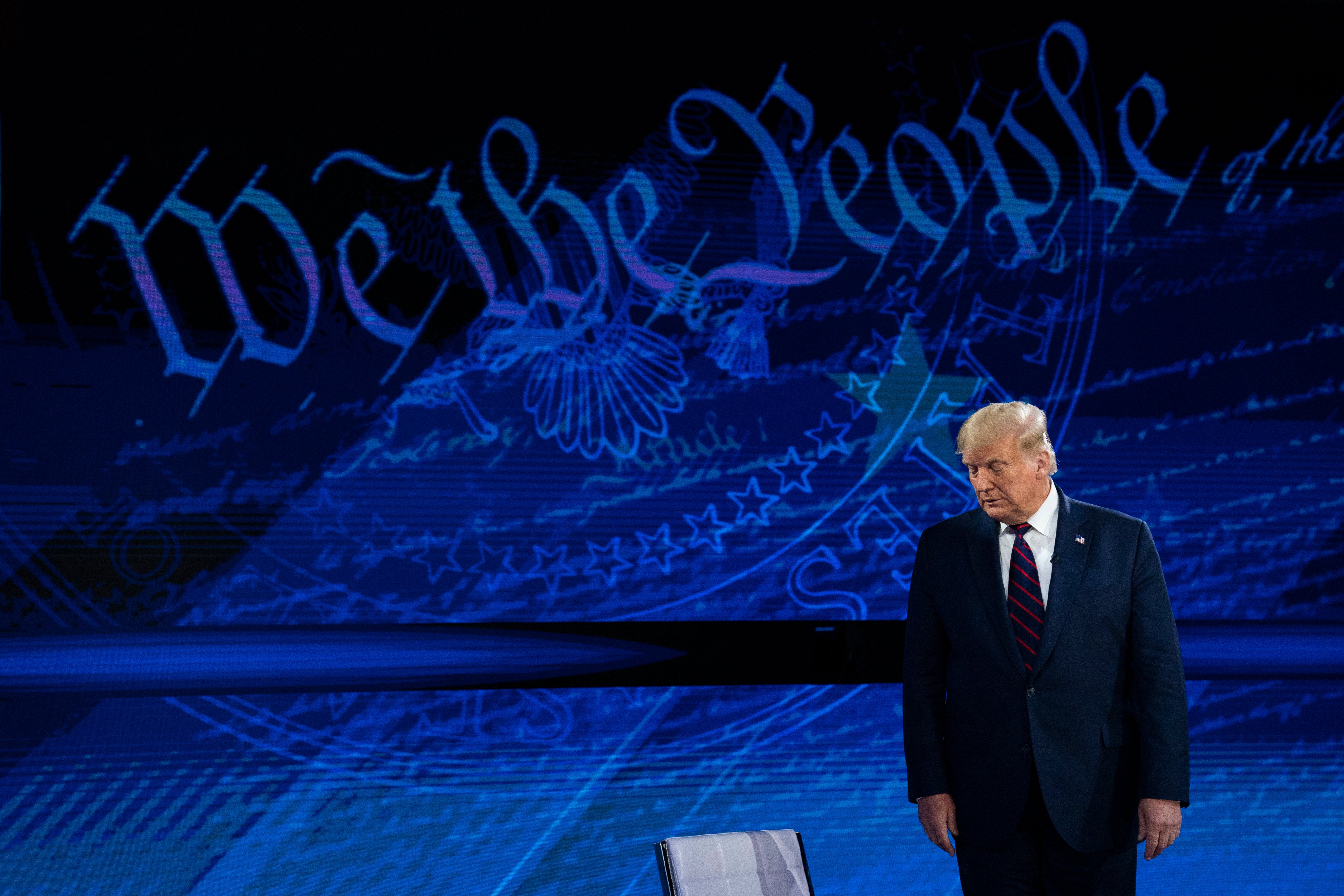 'Please stop and let me finish my question': Town hall questioner reacts to Trump interrupting her