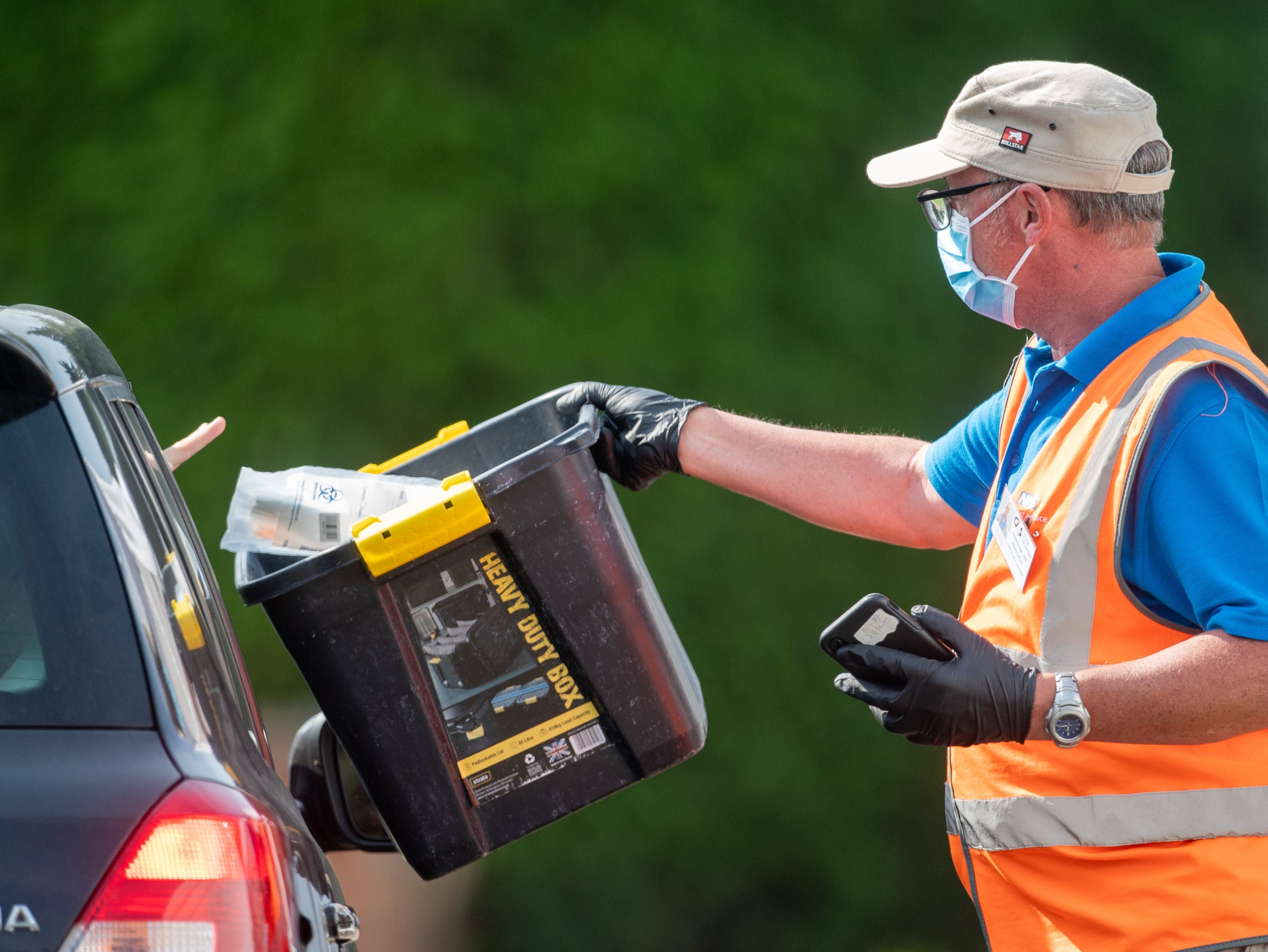 A coronavirus test is deposited at a mobile Covid-19 testing centre in Peterborough. (FILE)