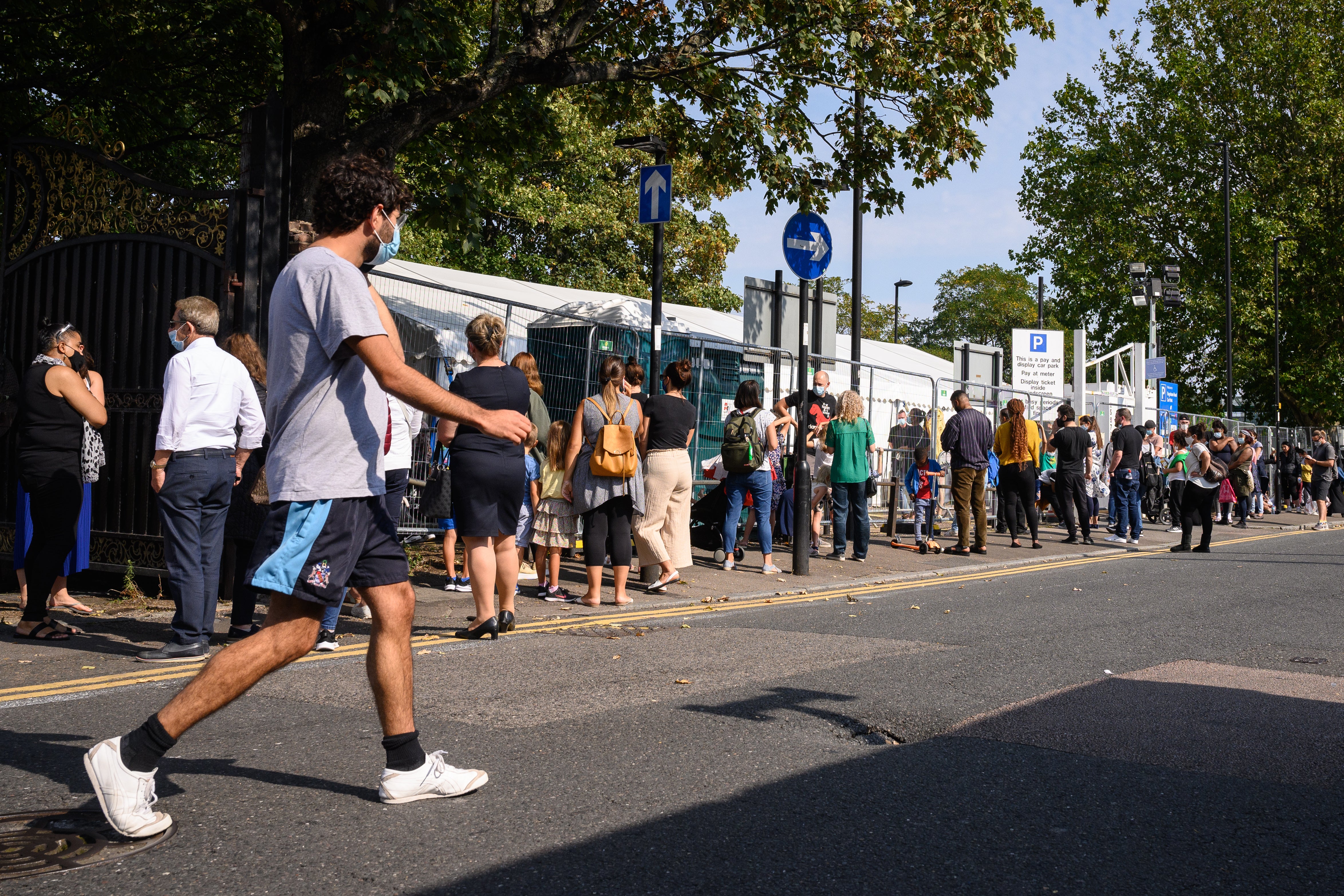 People queue up for a coronavirus test in London