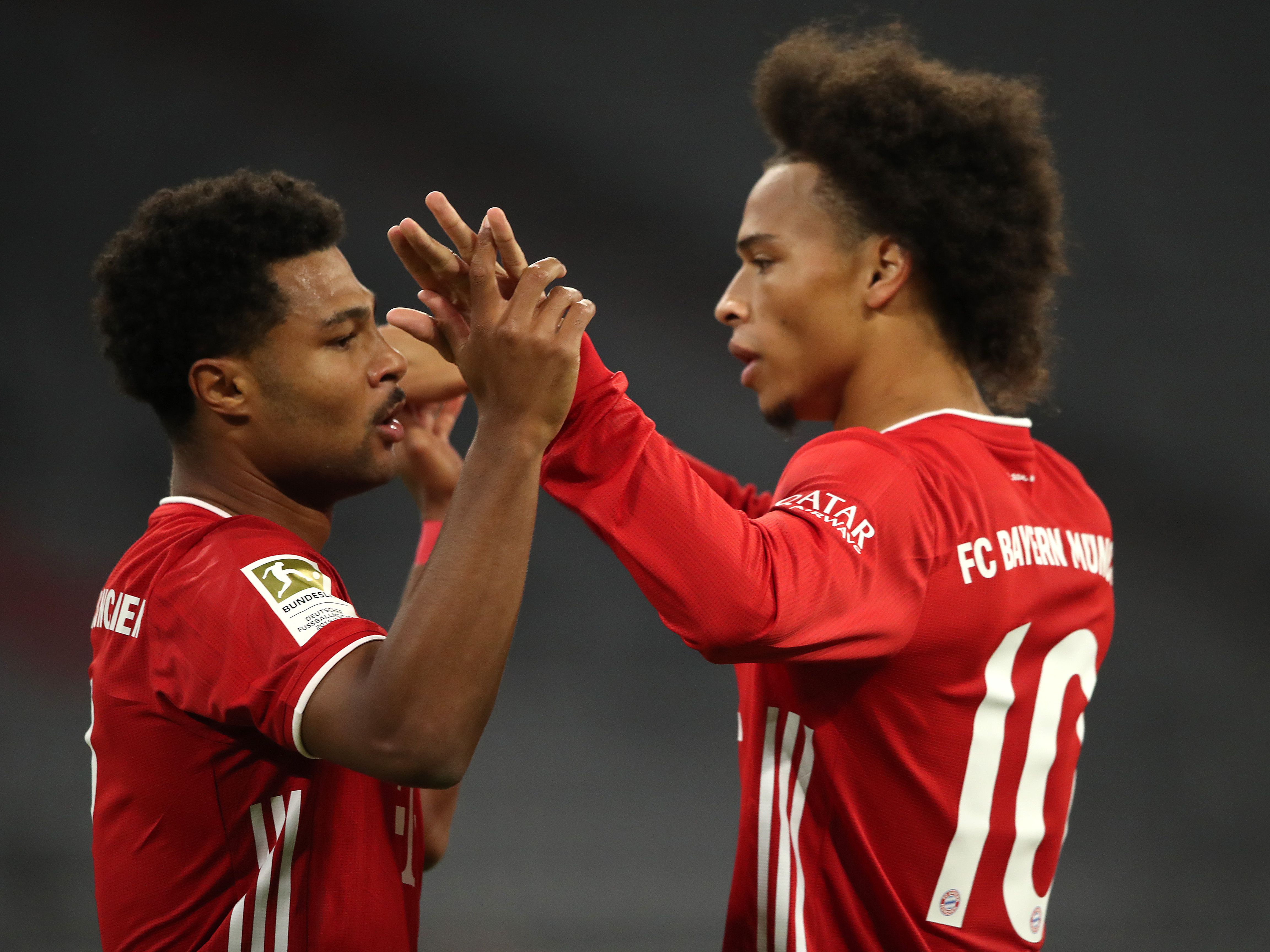 Serge Gnabry and Leroy Sane celebrate the opening goal