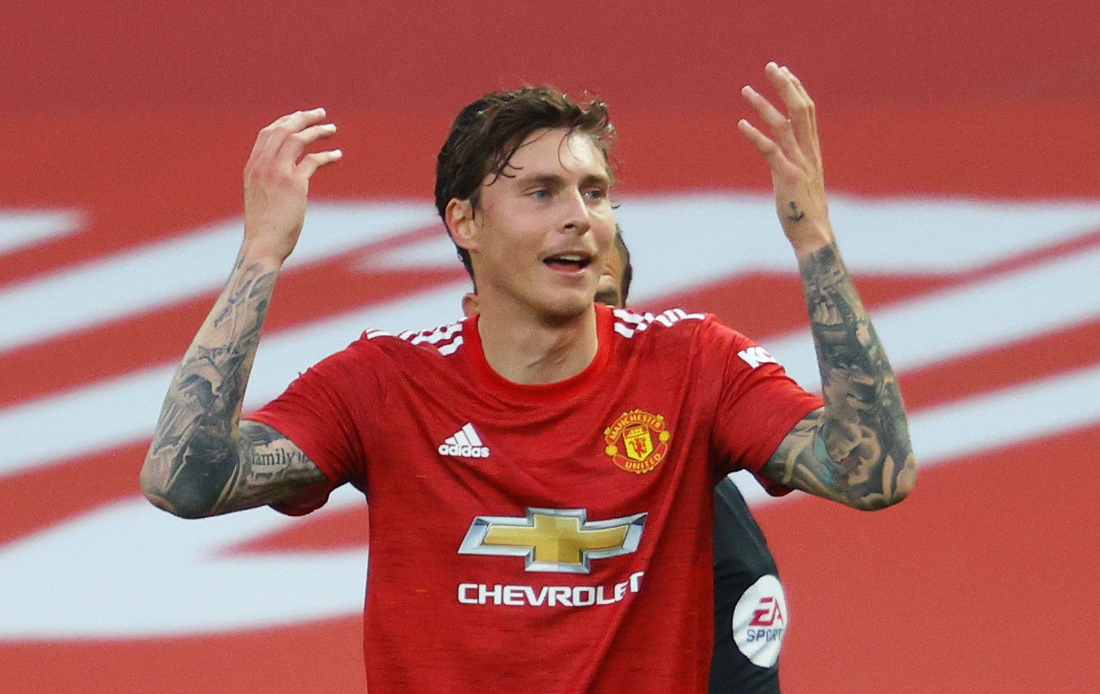 Victor Lindelof reacts after conceding a controversial penalty