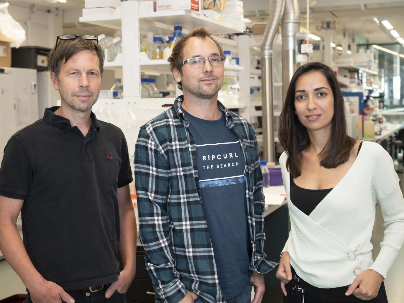 Bjorn Reinius, principal investigator of the study (centre) with co-first authors Ioanna Smyrlaki (right) and Anders Ekman