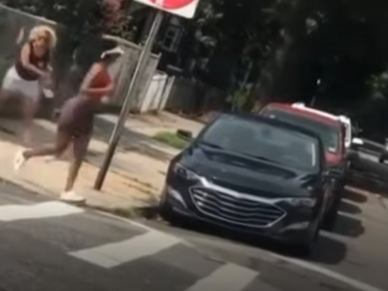 Woman charged with hate crime after footage showed her attacking black jogger in New York City
