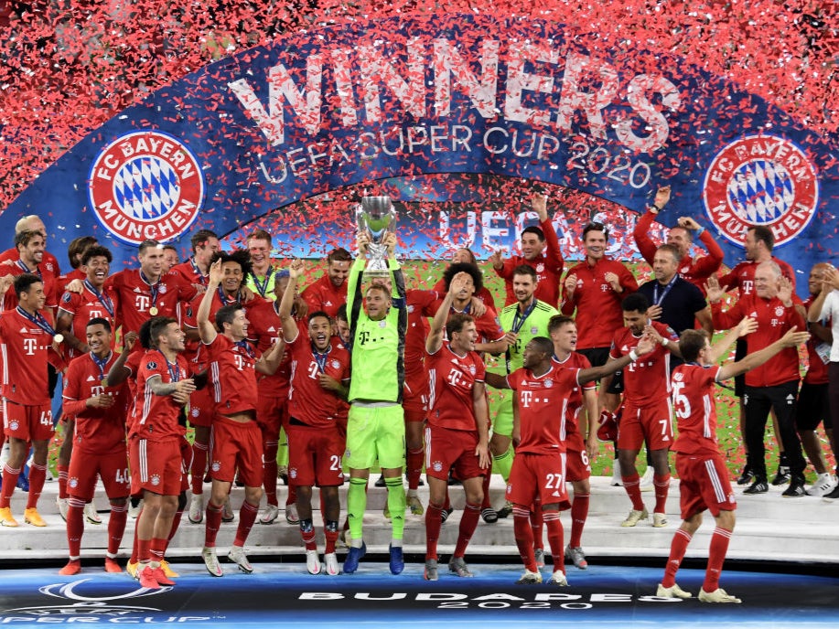 Manuel Neuer of Bayern Munich lifts the UEFA Super Cup trophy