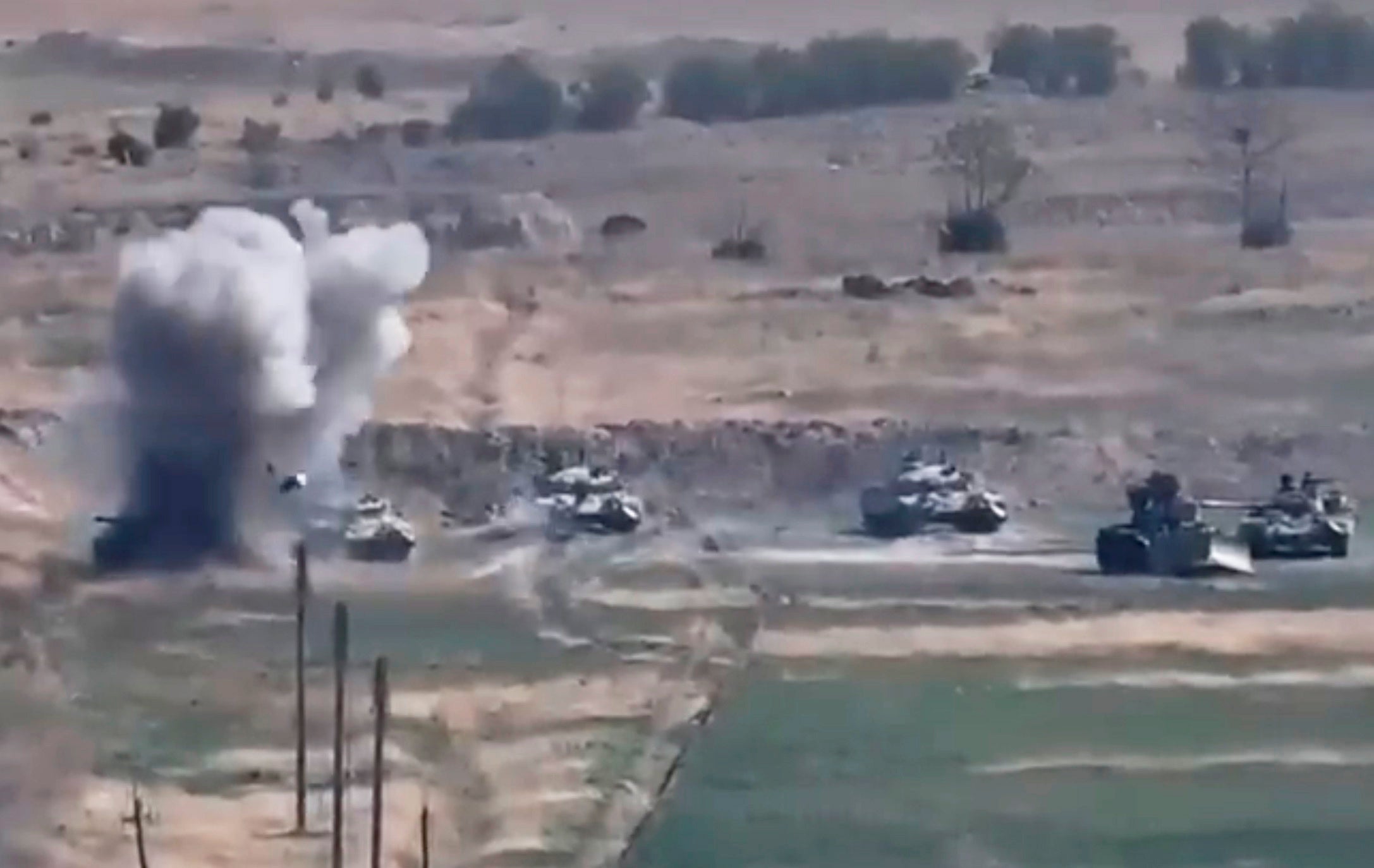 An Armenian military photo shows an attack on Azerbaijani armoured vehicles in Nagorno-Karabakh