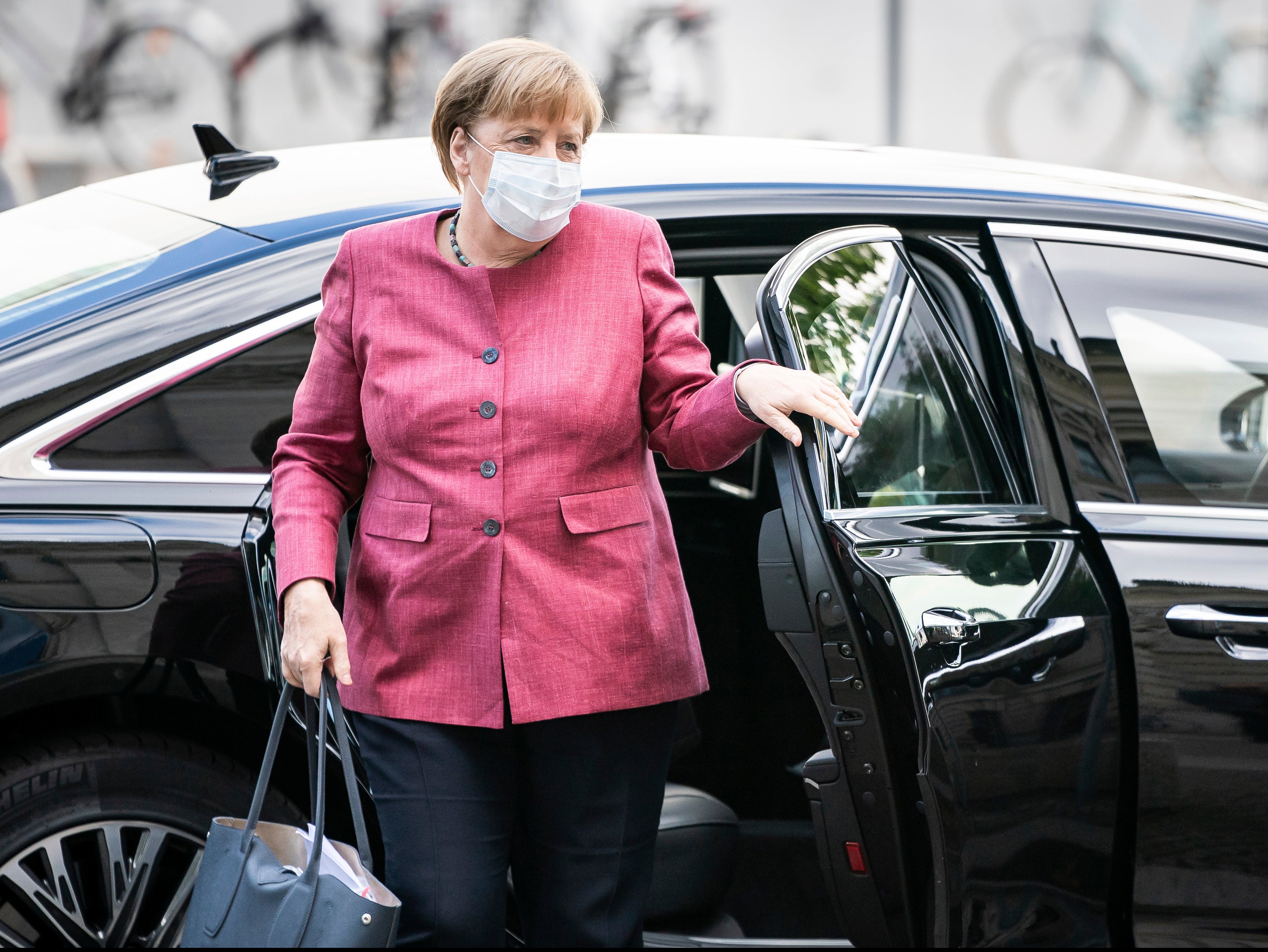 Angela Merkel has faced calls to halt a major gas pipeline from Russia to Germany