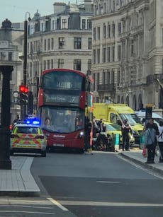 Woman in 80s critically injured after being hit by London bus