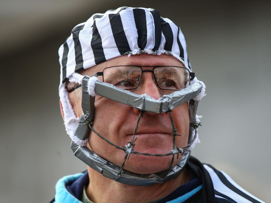 A protester wears a barbed wire mask as he attends a 'We Do Not Consent' anti-lockdown rally on 26 September, 2020 in London, England