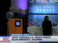 Democrats shield candidate from Lindsey Graham with plexiglass wall in election debate