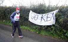 Thousands of runners battle wind and rain for virtual London Marathon