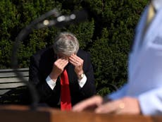 Trump and coronavirus: Viral picture shows White House chief of staff rubbing his head during president’s health briefing