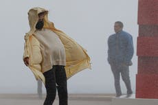 Flood warnings in place across UK as strong winds batter country