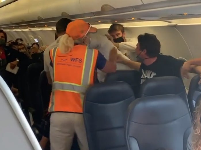 Passengers fight on flight after man refuses to wear mask