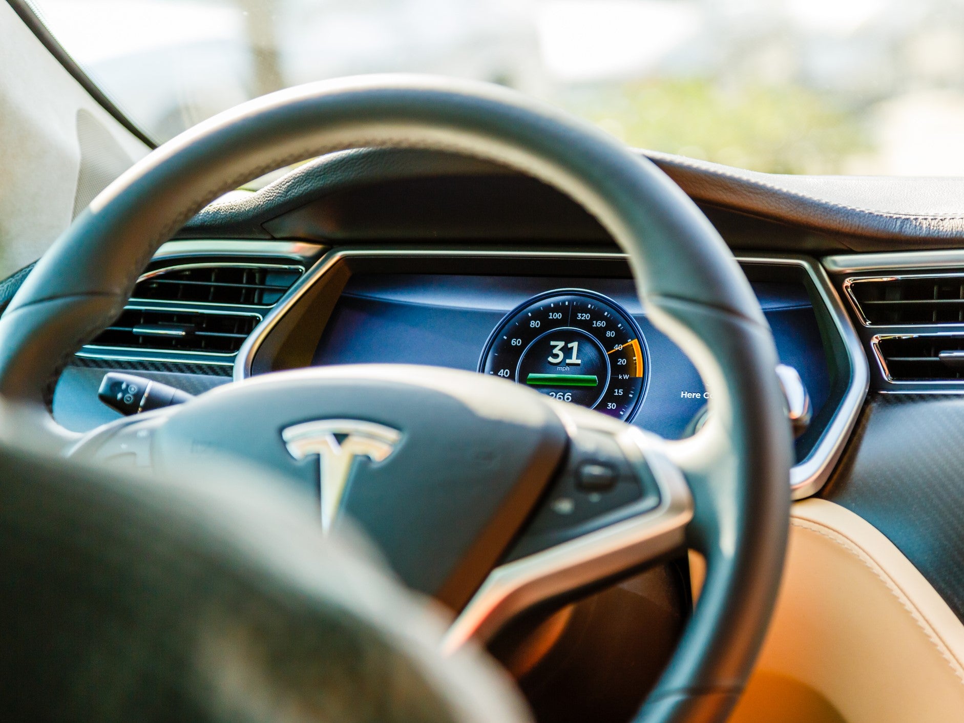 A camera on the rear-view mirror of the Tesla Model 3 can tell if a driver is looking at their phone in the moments before an accident