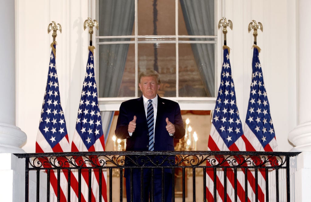 Donald Trump outside the White House, without a mask, just days after testing positive for coronavirus