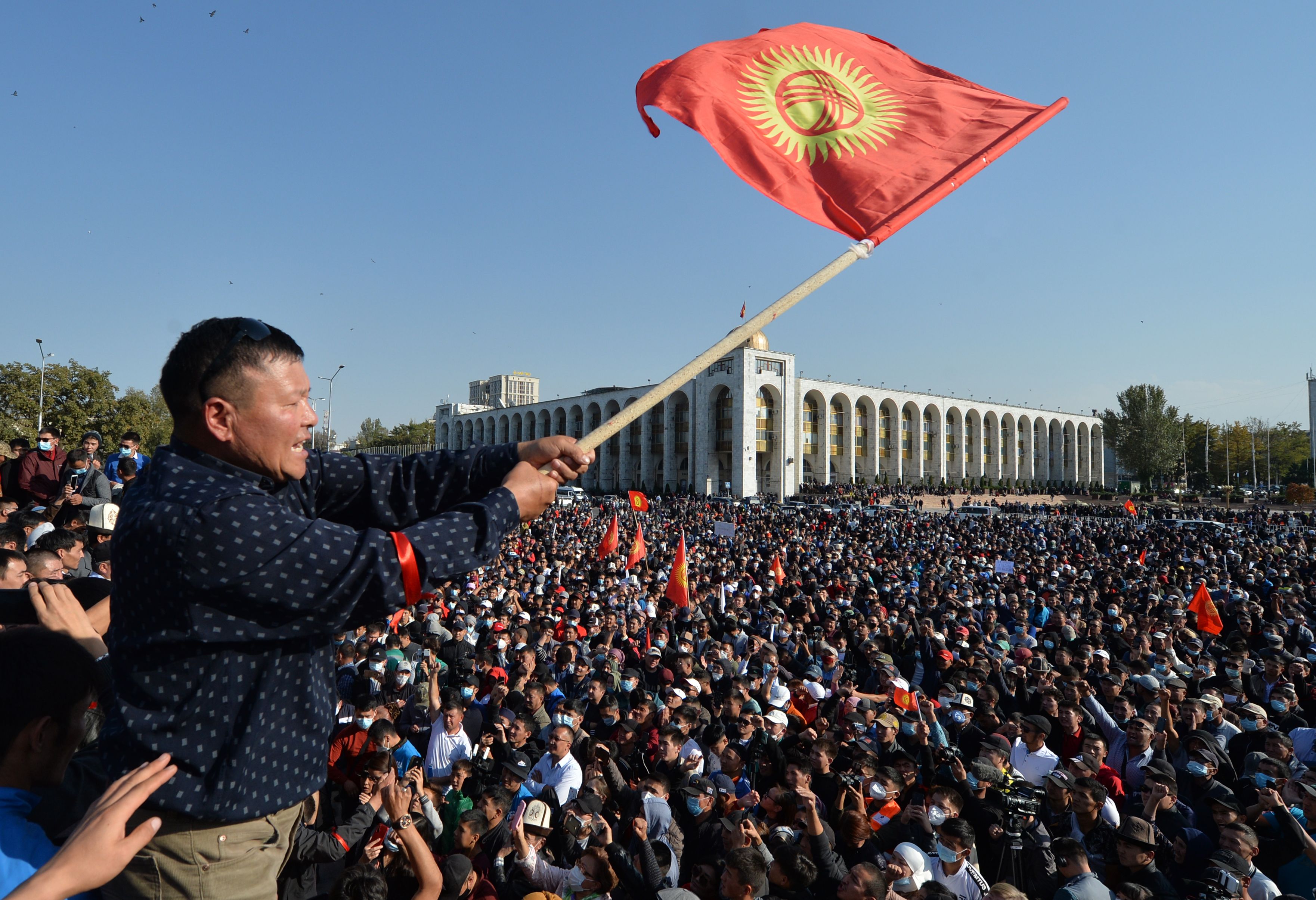 People protest against the results of a parliamentary vote in Bishkek