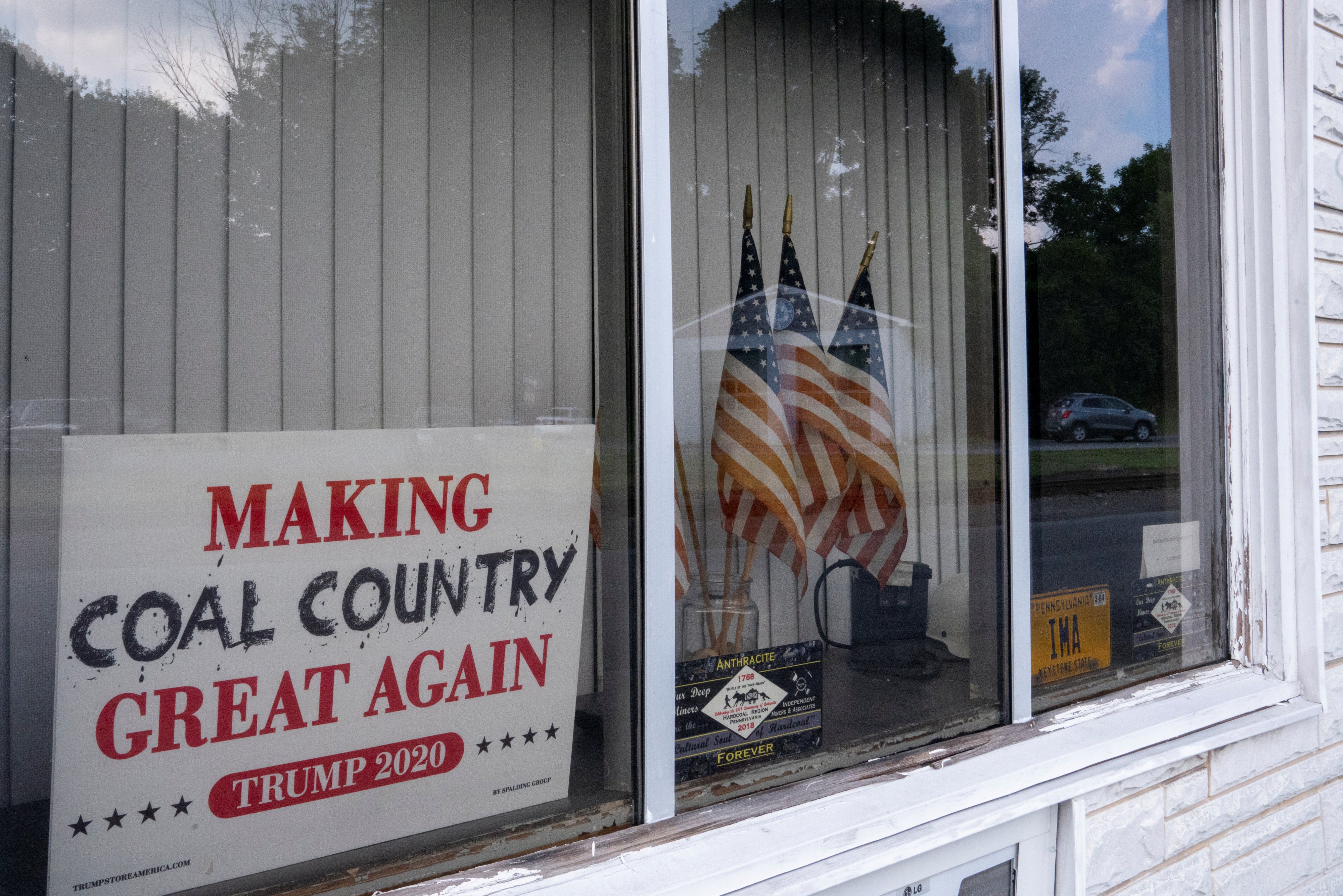 A pro-Trump sign in the window of the Independent Miners & Associates office, Tremont, Pennsylvania