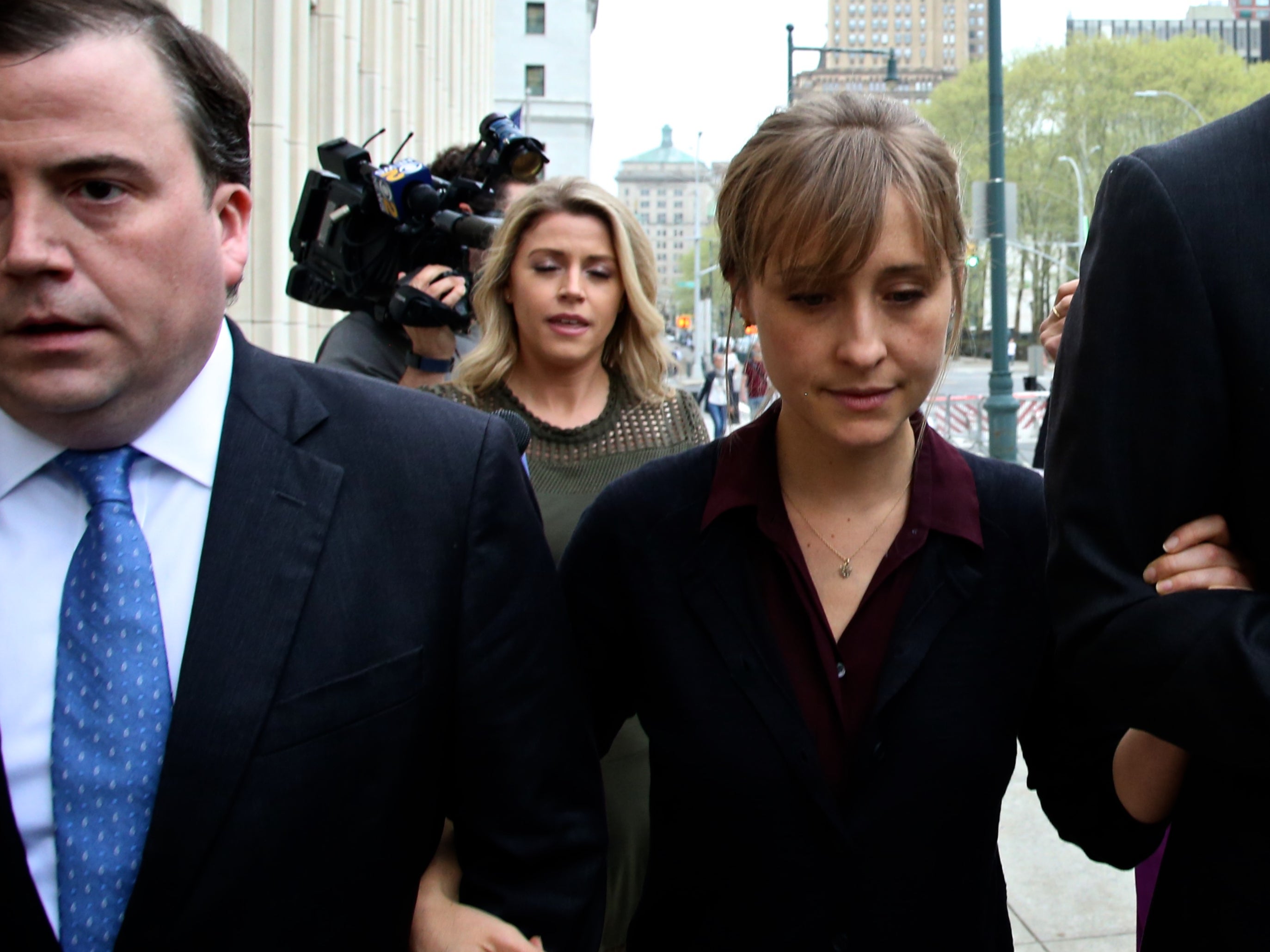 Allison Mack arrives at court in 2018