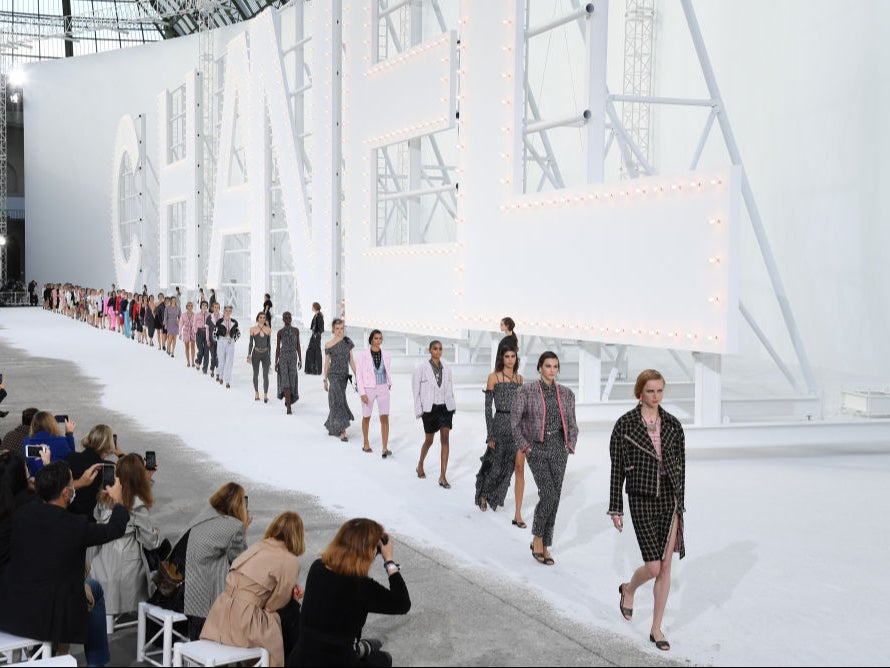 Models walk the runway during the Chanel Womenswear spring/summer 2021 show as part of Paris Fashion Week on 6 October