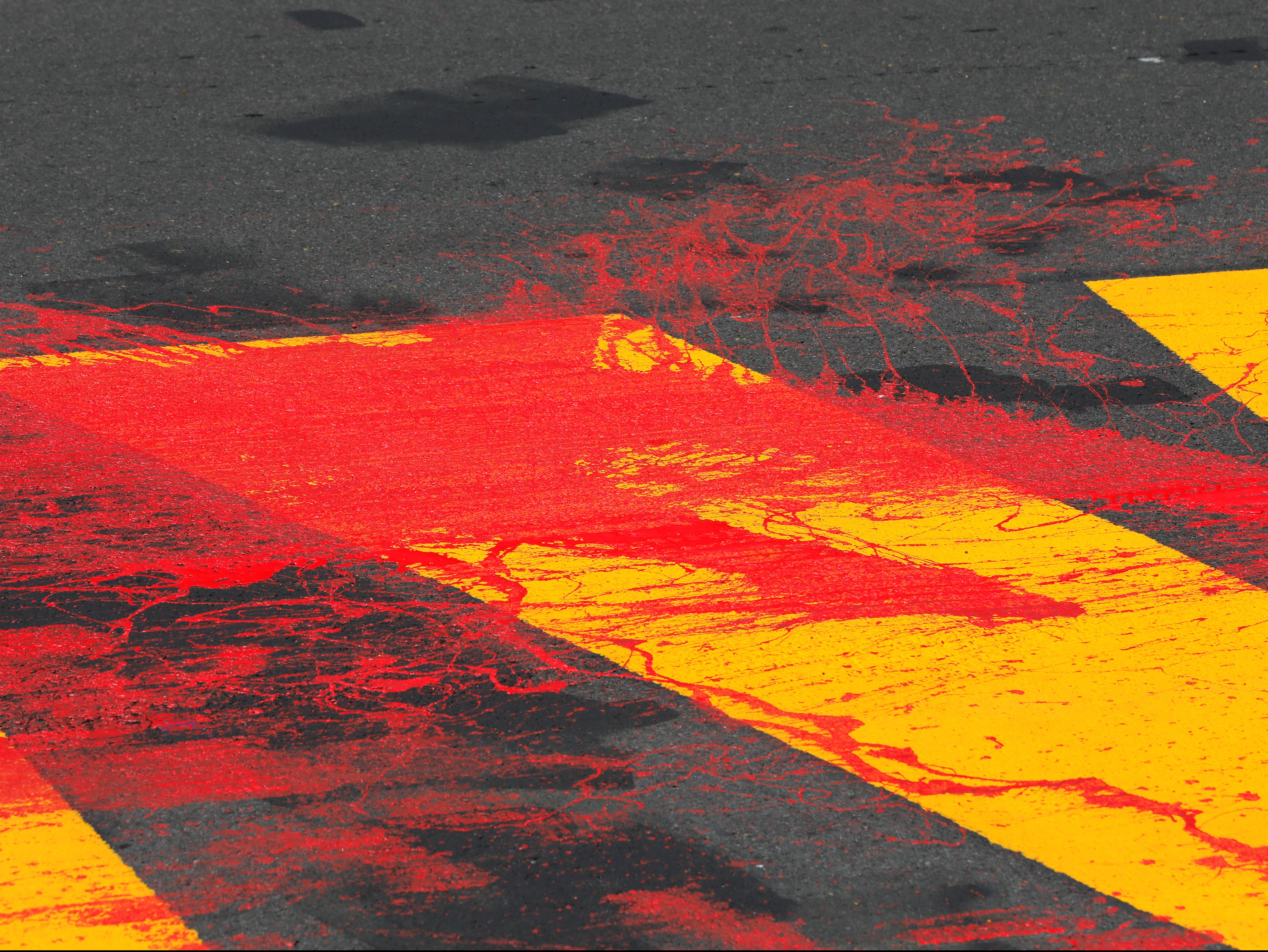 A portion of a "Black Lives Matter" mural that was vandalized with red paint along 5th Avenue outside Trump Tower