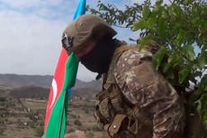 Armenia-Azerbaijan truce begins amid reports of new fighting