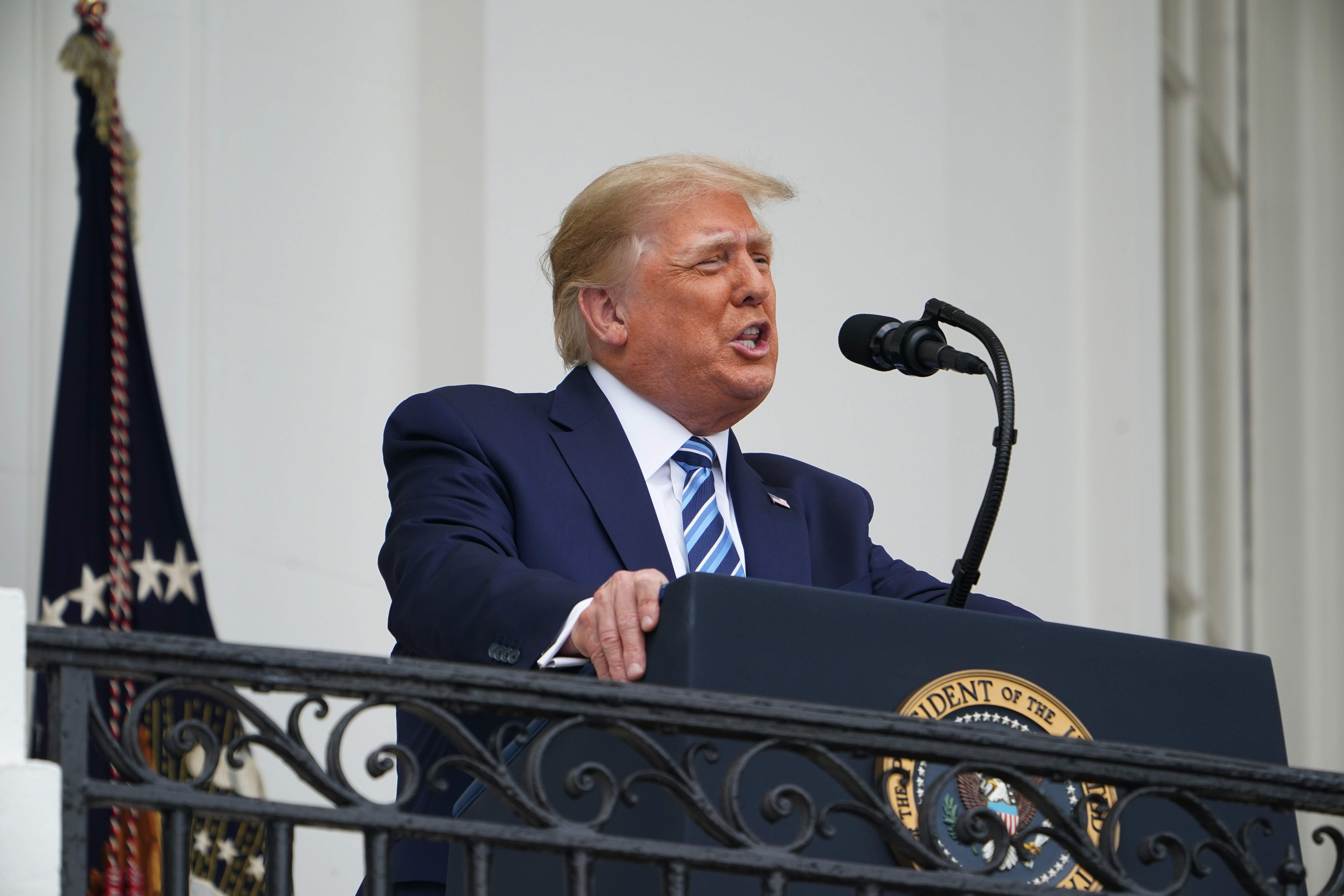 US President Donald Trump speaks about law and order from the South Portico of the White House in Washington, DC, on October 10, 2020. - Trump spoke publicly for the first time since testing positive for Covid-19, as he prepares a rapid return to the campaign trail just three weeks before the election.