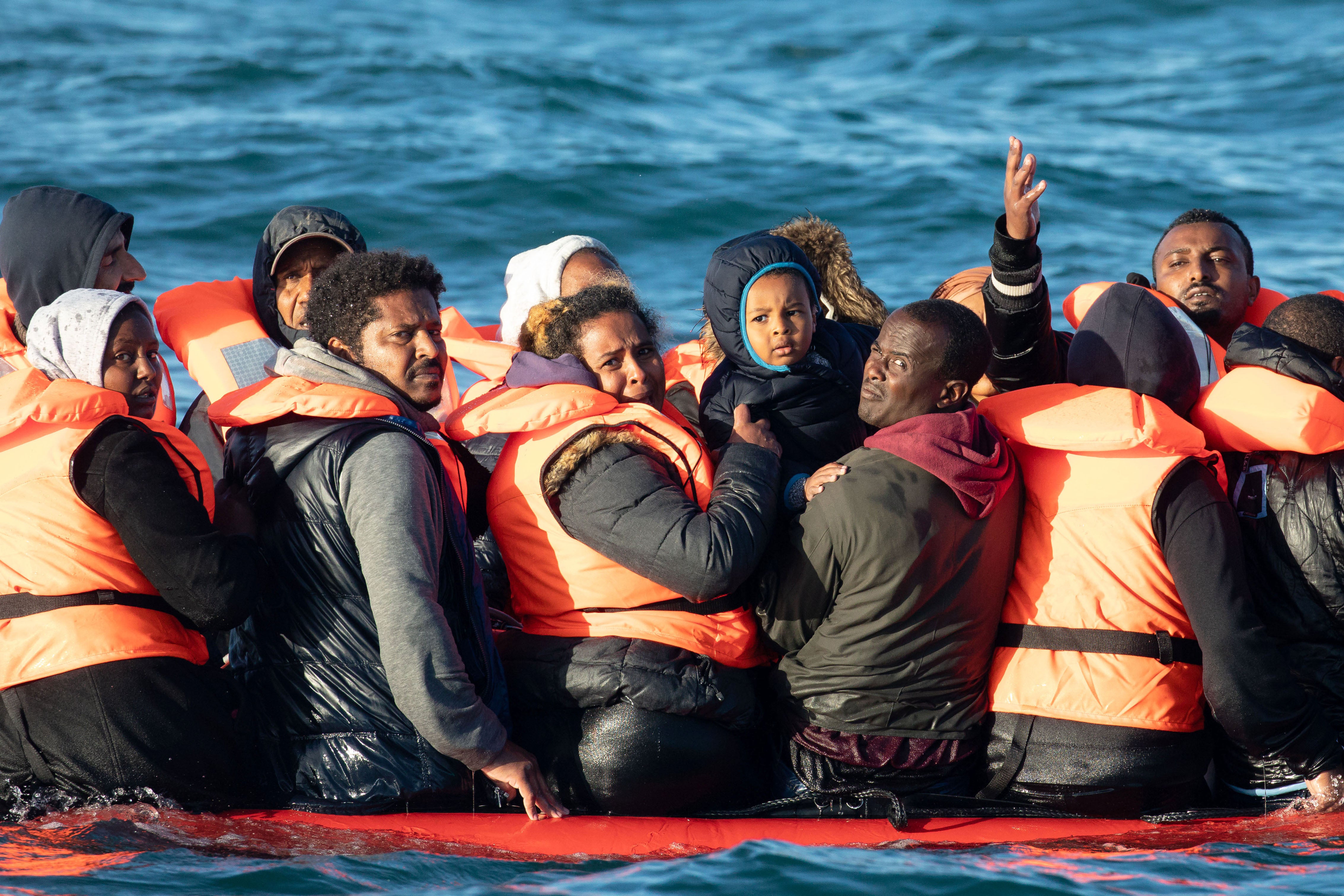 People crossing the English channel on an inflatable boat near Dover