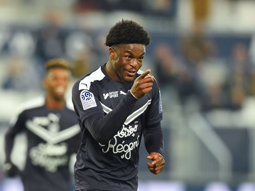 Josh Maja celebrates scoring a hat-trick for Bordeaux in December 2019