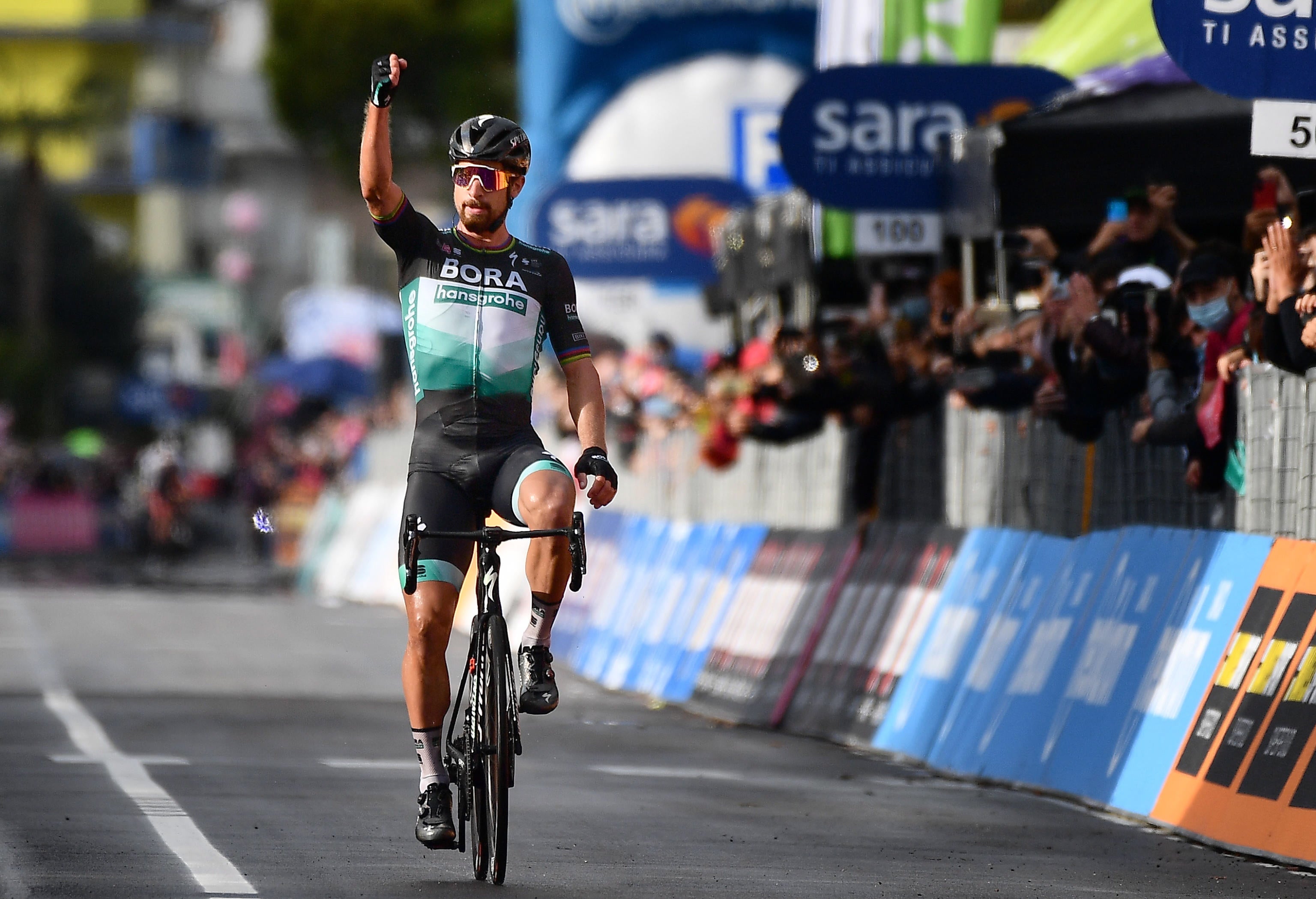 Peter Sagan celebrates as he crosses the line to win stage 10