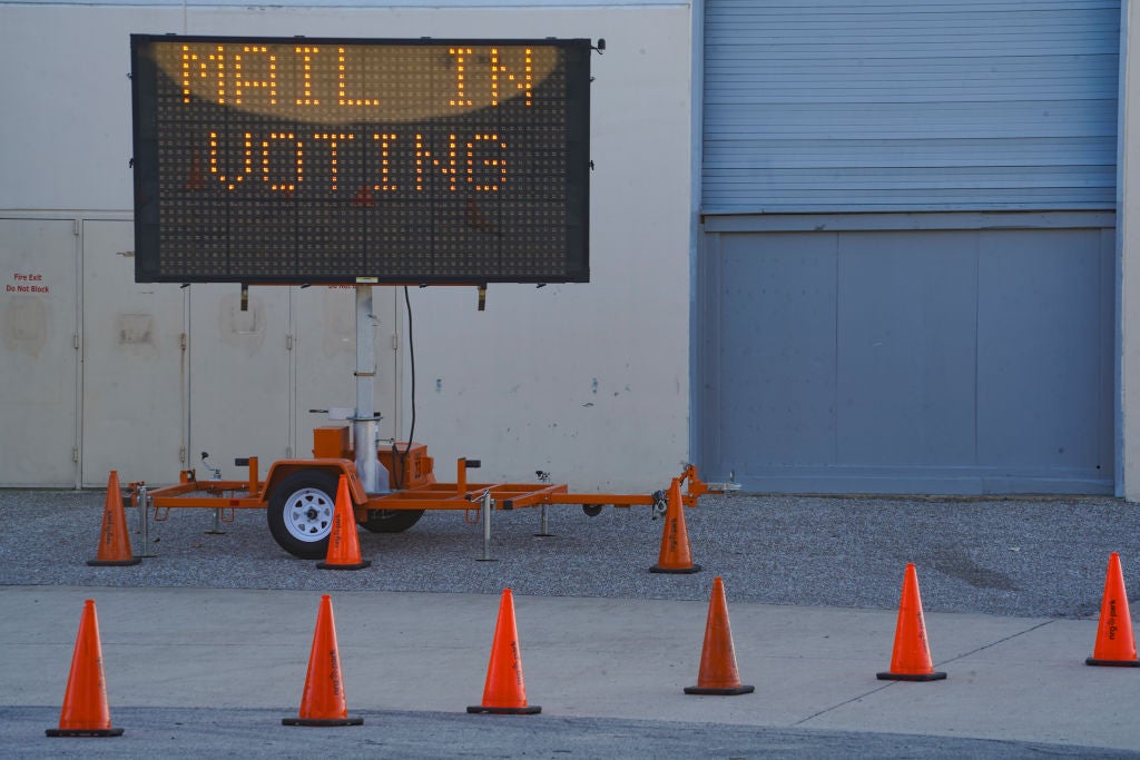 A drive-through mail ballot drop off site at the NRG Stadium in Houston, Texas