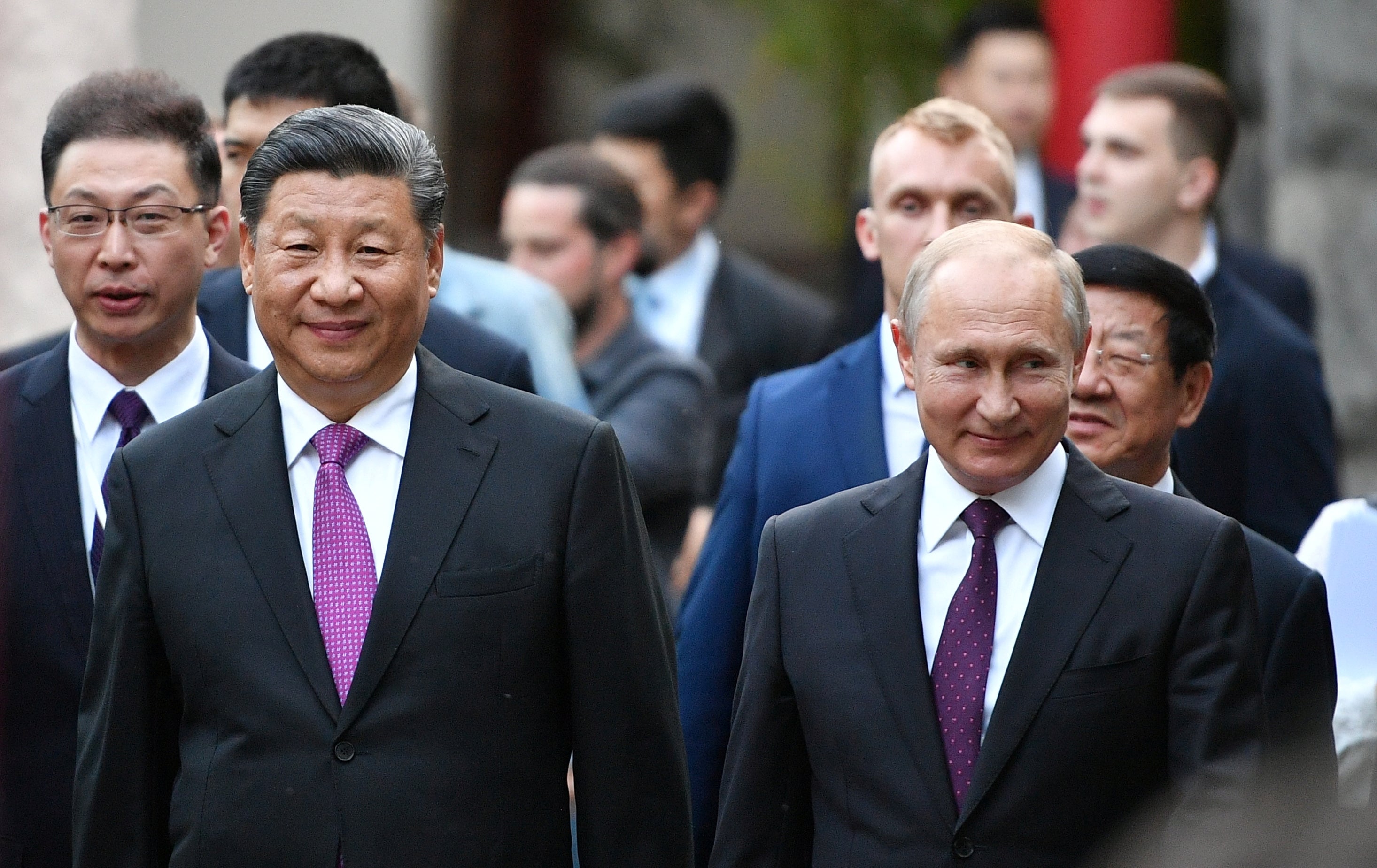 File: China’s Xi Jinping and Russia’ Vladimir Putin on a visit to Moscow Zoo in June 2019